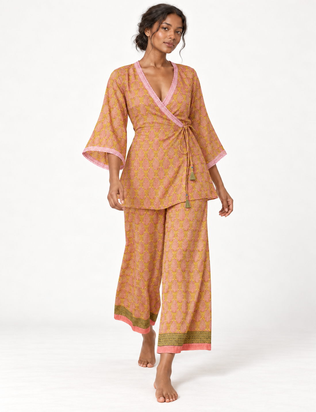 Pink tunic set with micro leaf pattern, turquoise trim on neckline and sleeves, and matching wide-leg pants with border print