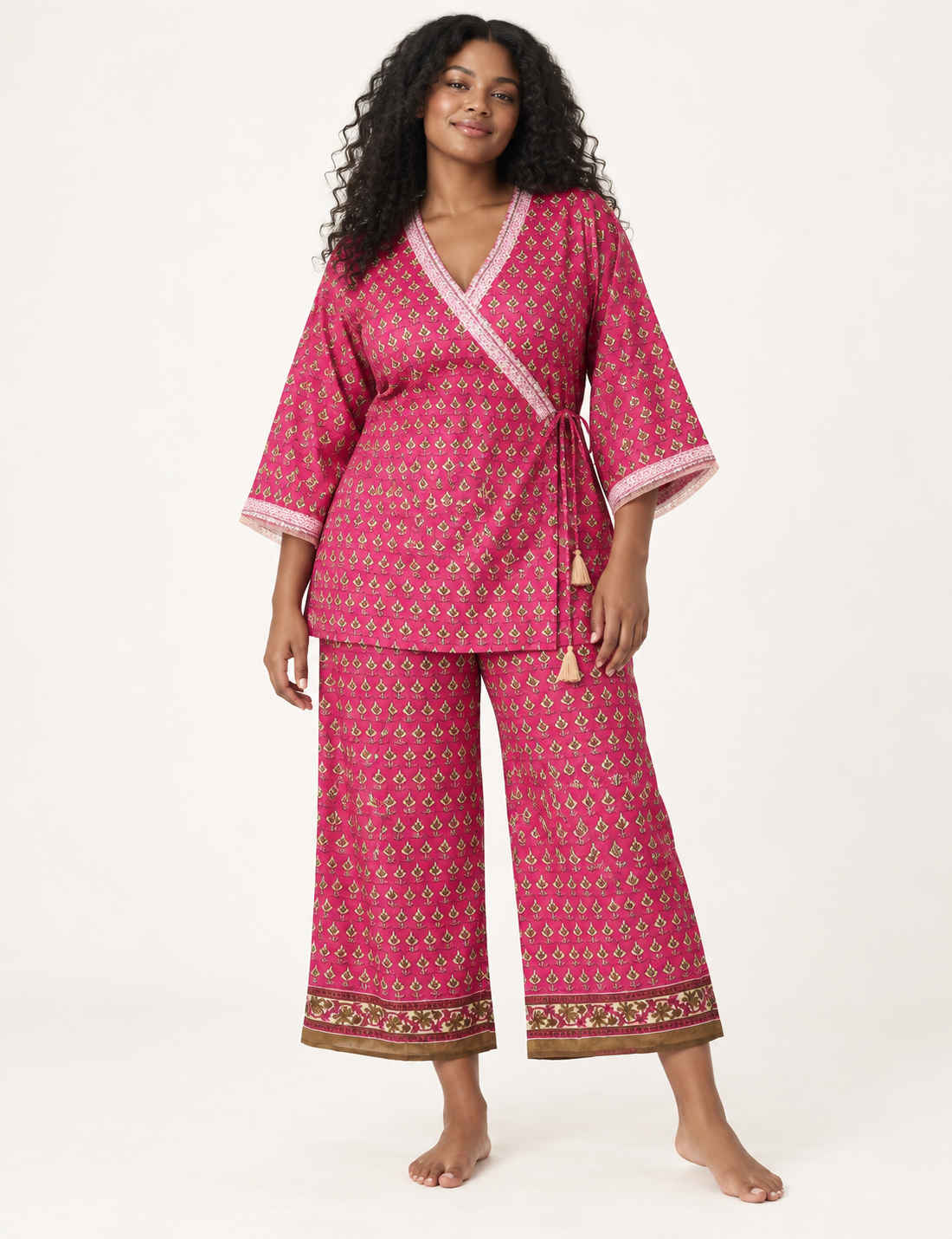 Pink tunic set with micro leaf pattern, turquoise trim on neckline and sleeves, and matching wide-leg pants with border print