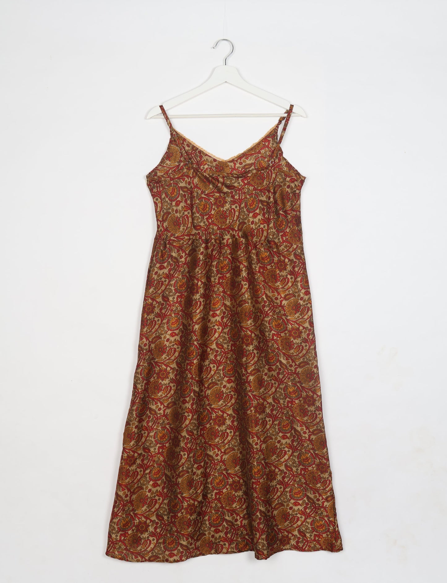 Spaghetti strap dress made from sustainable materials, embodying ethical fashion principles. Ideal for eco-friendly travelers seeking laid-back style.