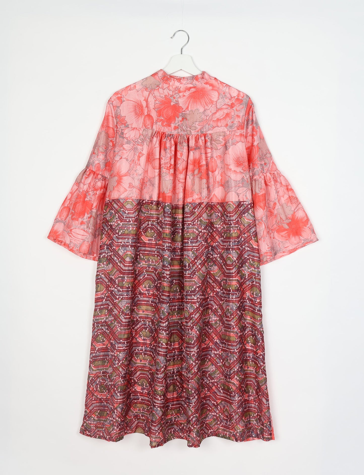 Discover ethical elegance with our Bell Sleeve Coat, handcrafted by Indian artisans from recycled materials. This sustainable fashion piece is a statement in eco-friendly clothing, combining style and consciousness effortlessly.