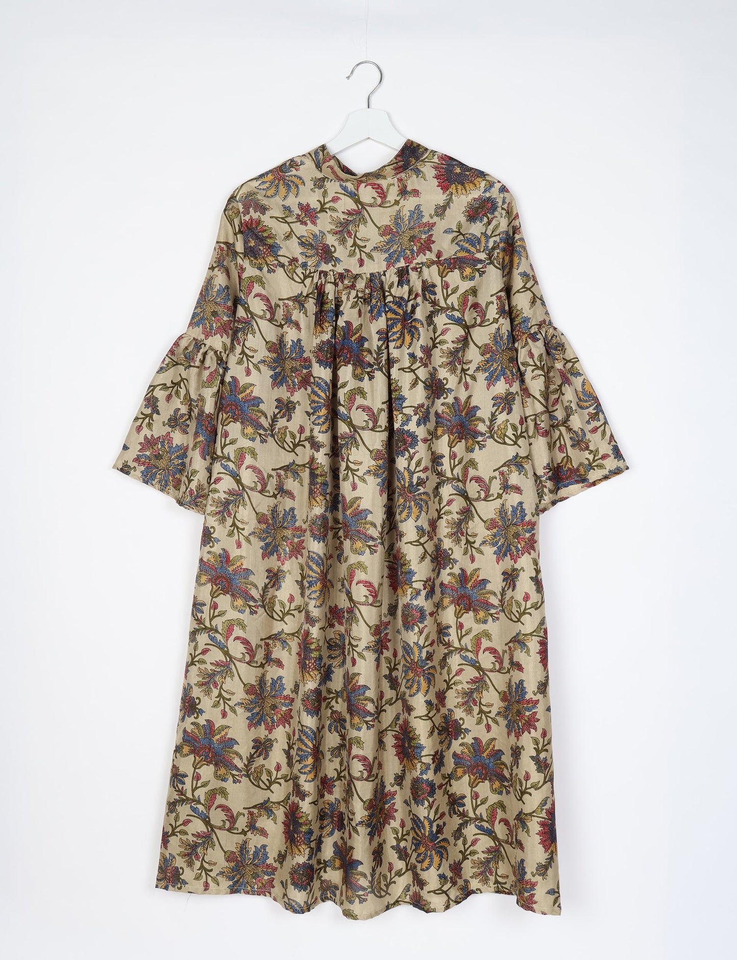 Discover ethical elegance with our Bell Sleeve Coat, handcrafted by Indian artisans from recycled materials. This sustainable fashion piece is a statement in eco-friendly clothing, combining style and consciousness effortlessly.