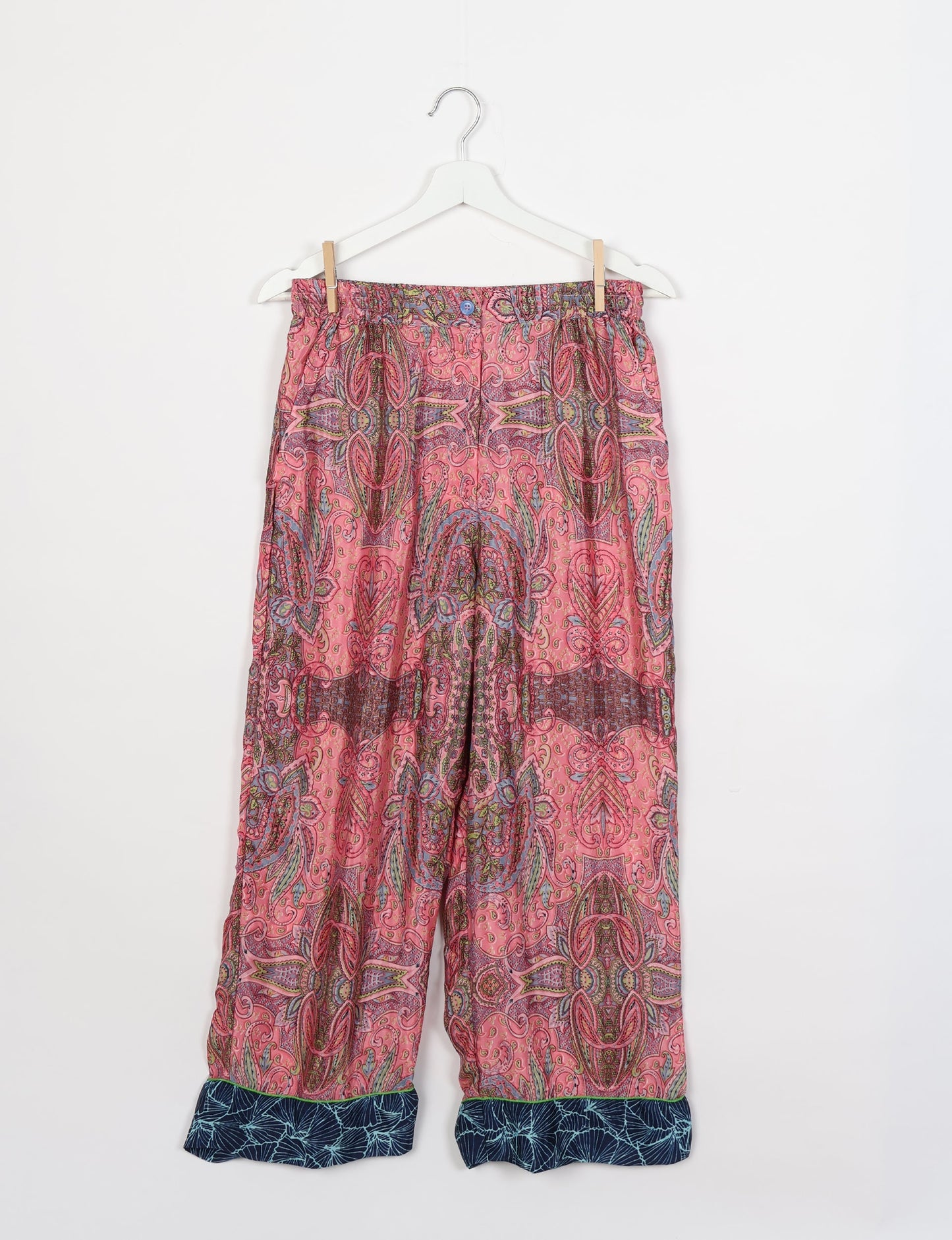 Chic long-sleeve pajama set made from recycled materials, representing eco friendly products, repurposed clothing, and zero waste clothing in green fashion.