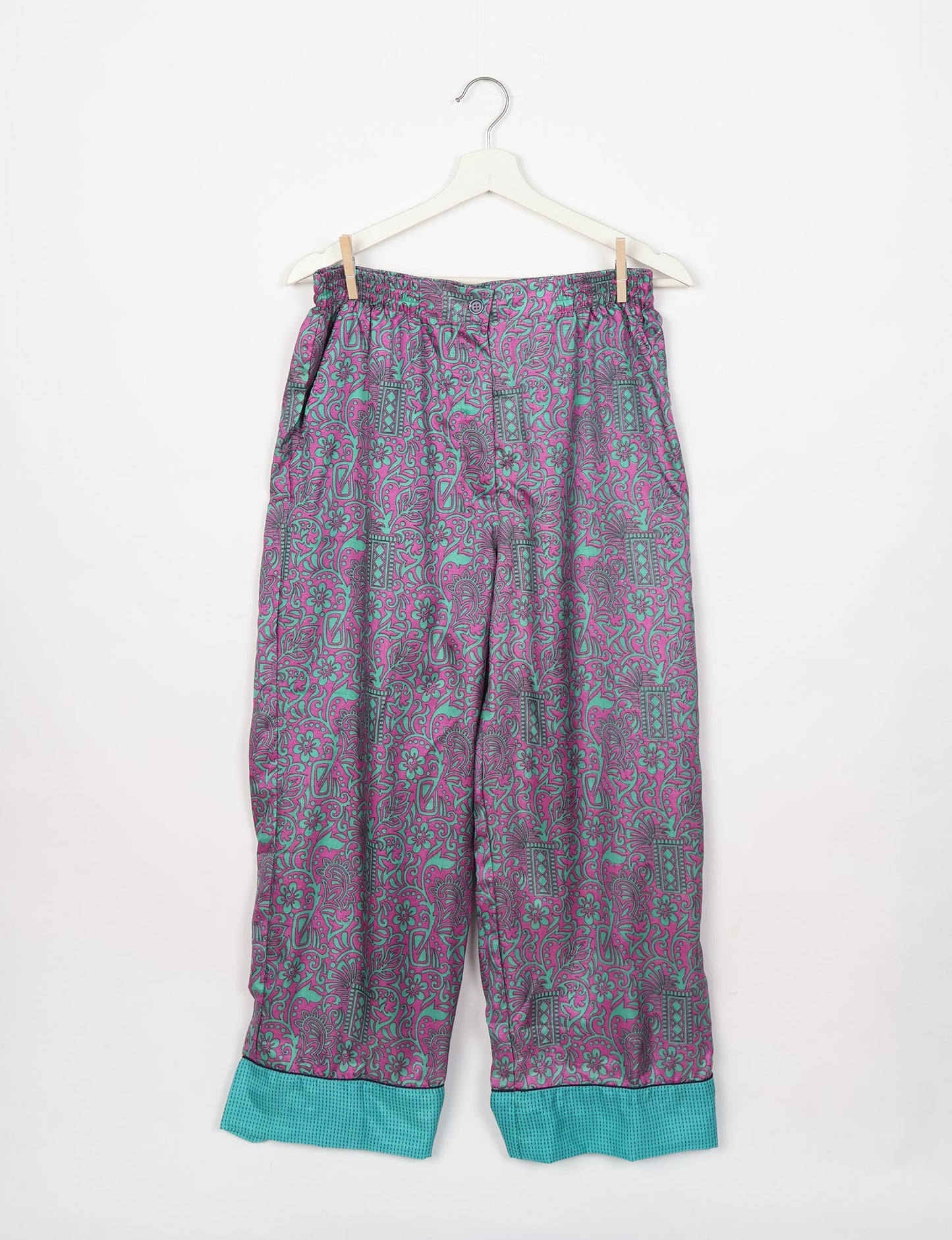 Chic long-sleeve pajama set made from recycled materials, representing eco friendly products, repurposed clothing, and zero waste clothing in green fashion.