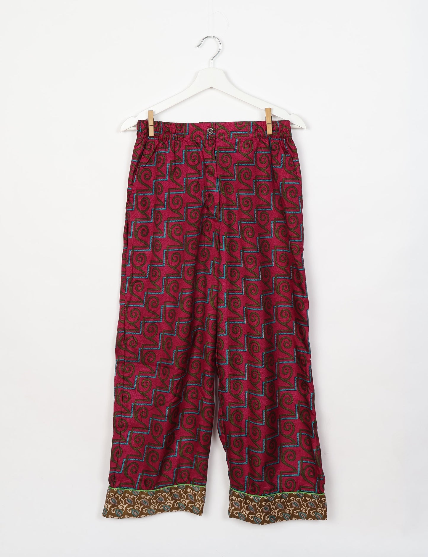 Chic long-sleeve pajama set made from recycled materials, representing eco friendly products, repurposed clothing, and zero waste clothing in green fashion.