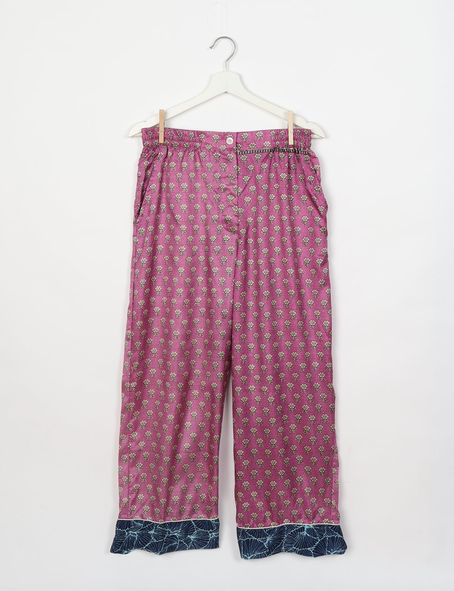 Chic long-sleeve pajama set made from recycled materials, representing eco friendly products, repurposed clothing, and zero waste clothing in green fashion.