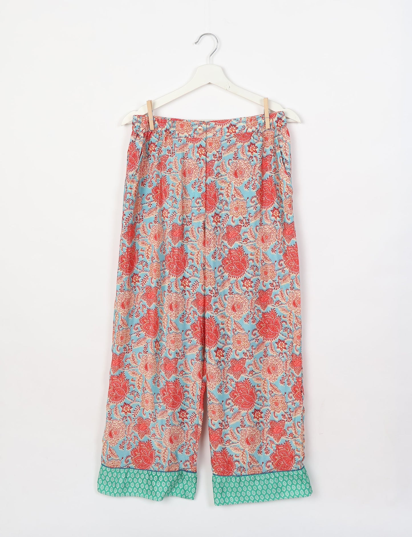 Chic long-sleeve pajama set made from recycled materials, representing eco friendly products, repurposed clothing, and zero waste clothing in green fashion.