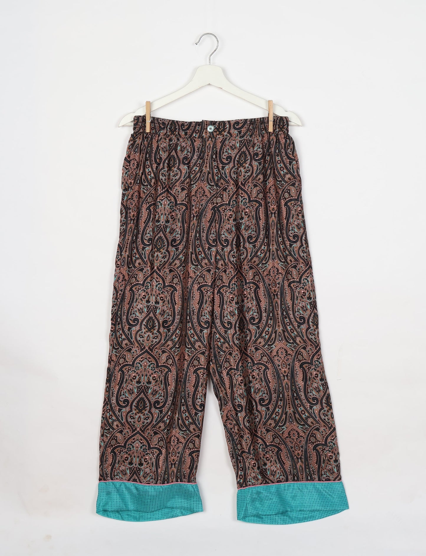 Chic long-sleeve pajama set made from recycled materials, representing eco friendly products, repurposed clothing, and zero waste clothing in green fashion.