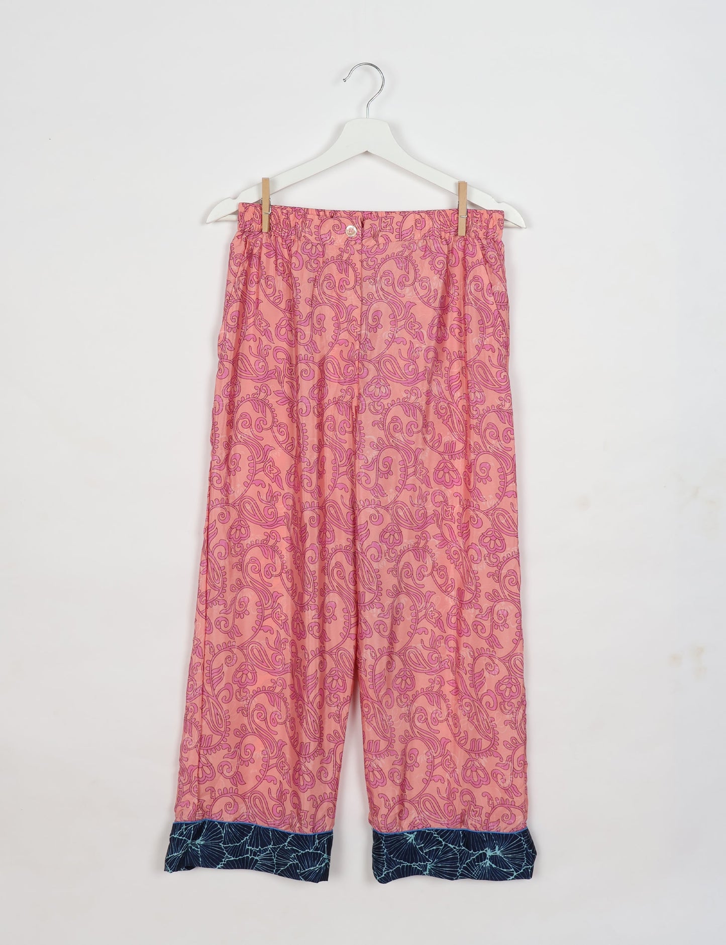 Chic long-sleeve pajama set made from recycled materials, representing eco friendly products, repurposed clothing, and zero waste clothing in green fashion.