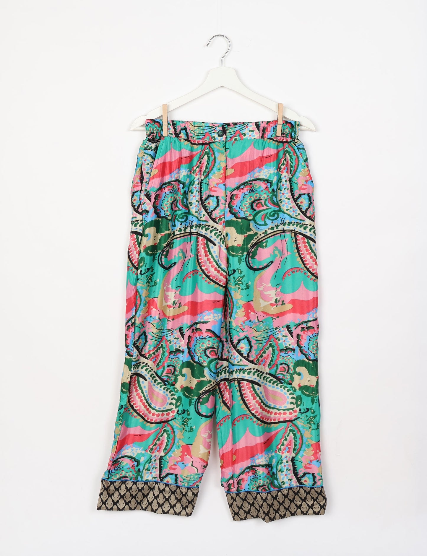 Chic long-sleeve pajama set made from recycled materials, representing eco friendly products, repurposed clothing, and zero waste clothing in green fashion.