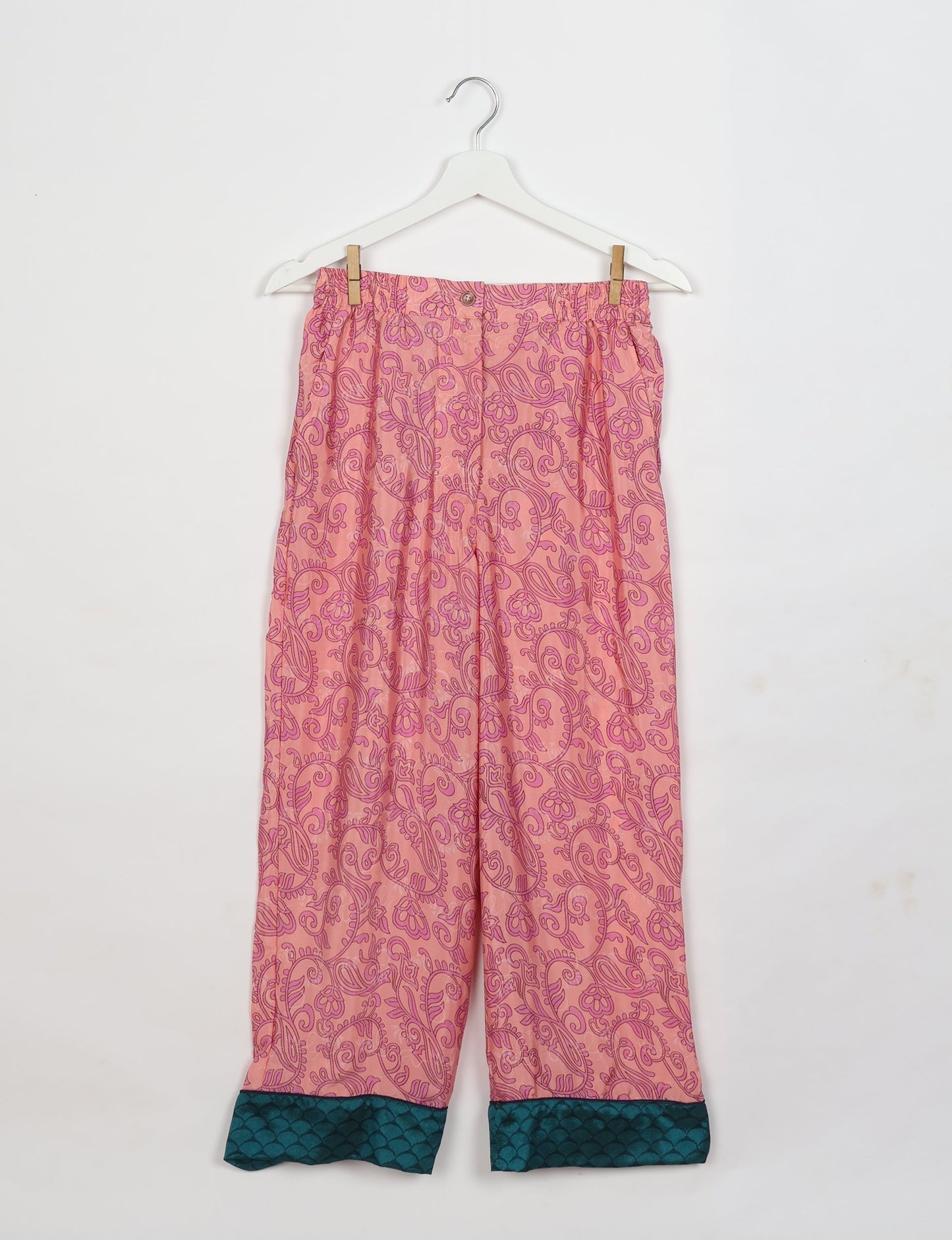 Chic long-sleeve pajama set made from recycled materials, representing eco friendly products, repurposed clothing, and zero waste clothing in green fashion.