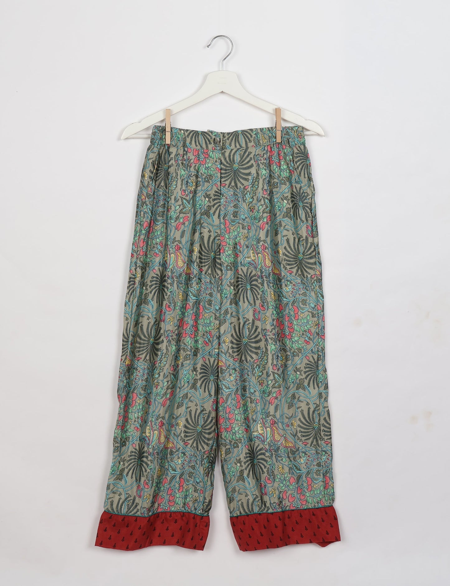 Chic long-sleeve pajama set made from recycled materials, representing eco friendly products, repurposed clothing, and zero waste clothing in green fashion.