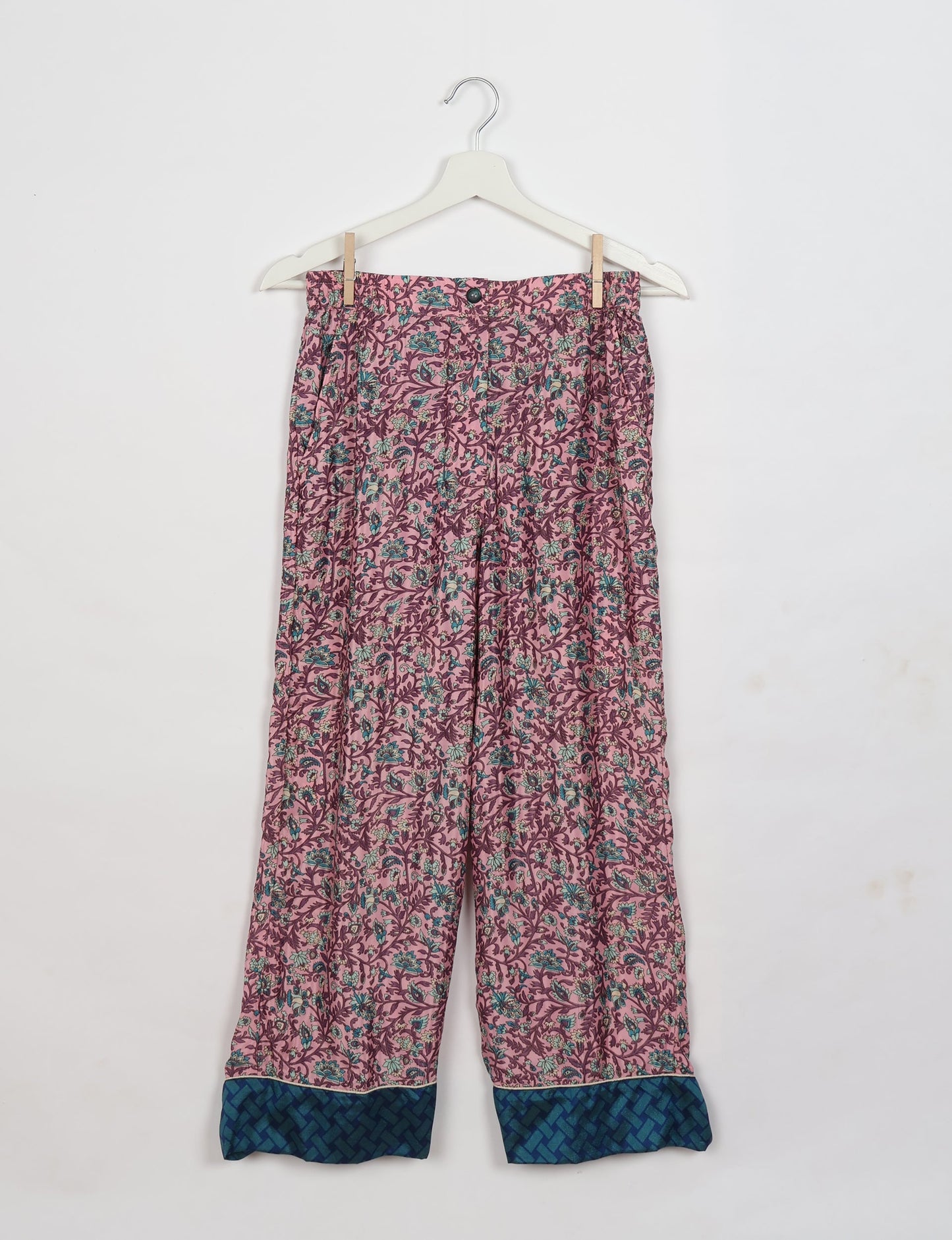 Chic long-sleeve pajama set made from recycled materials, representing eco friendly products, repurposed clothing, and zero waste clothing in green fashion.