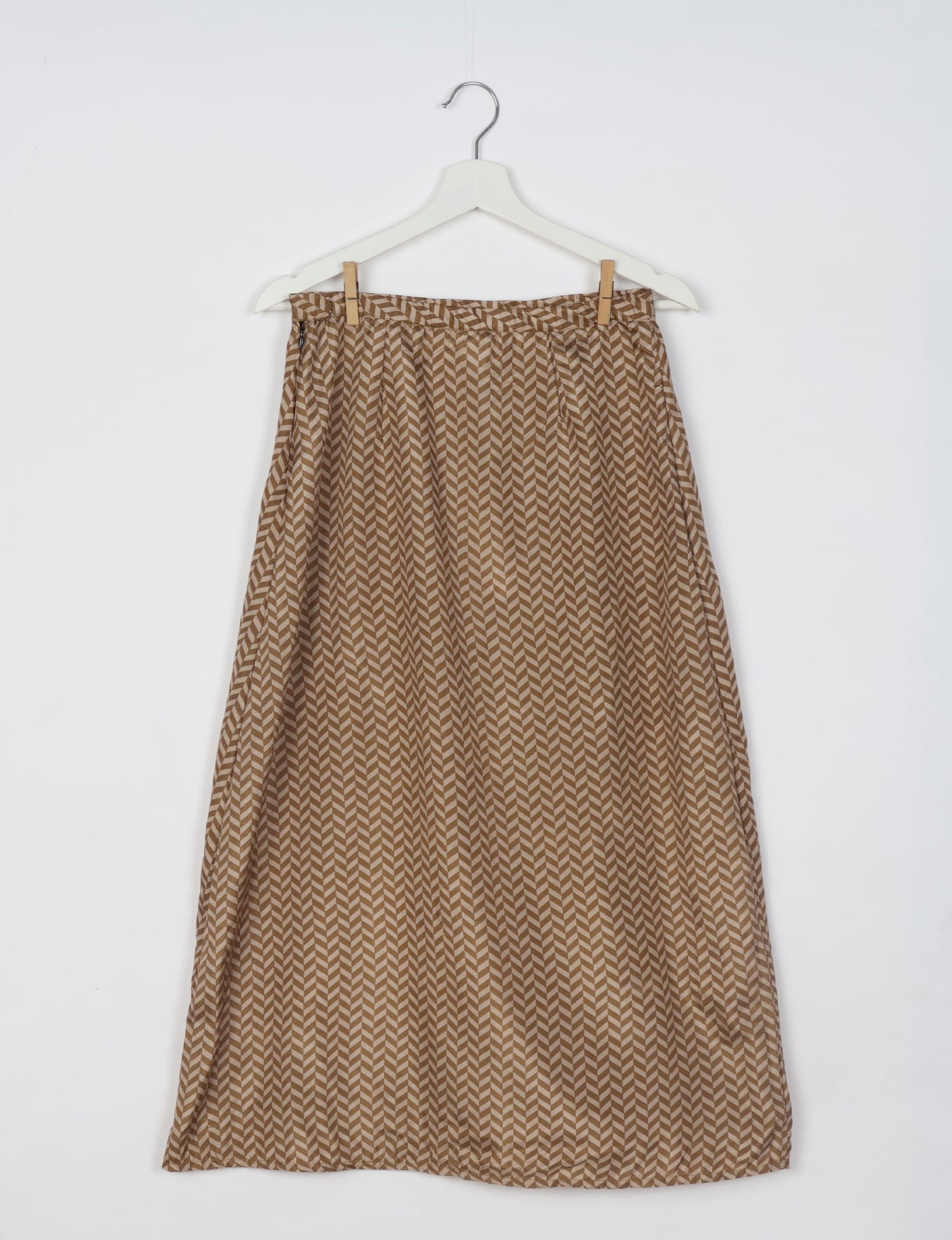 Sustainable A LINE SKIRT, a high-fashion choice for conscious individuals. Fitted at the waist, ankle-length, and ethically crafted for eco-friendly style.