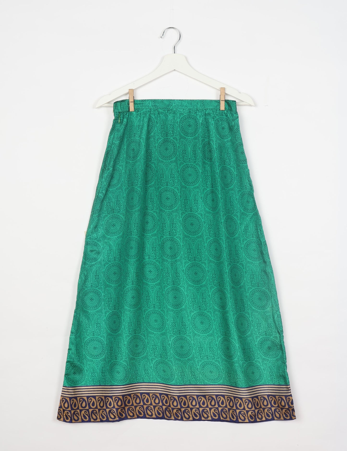 Sustainable A LINE SKIRT, a high-fashion choice for conscious individuals. Fitted at the waist, ankle-length, and ethically crafted for eco-friendly style.