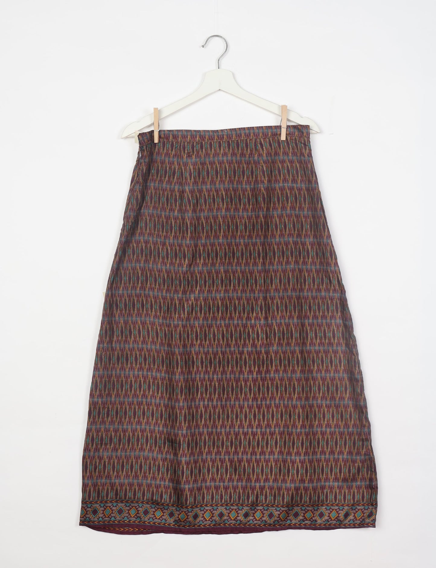 Sustainable A LINE SKIRT, a high-fashion choice for conscious individuals. Fitted at the waist, ankle-length, and ethically crafted for eco-friendly style.