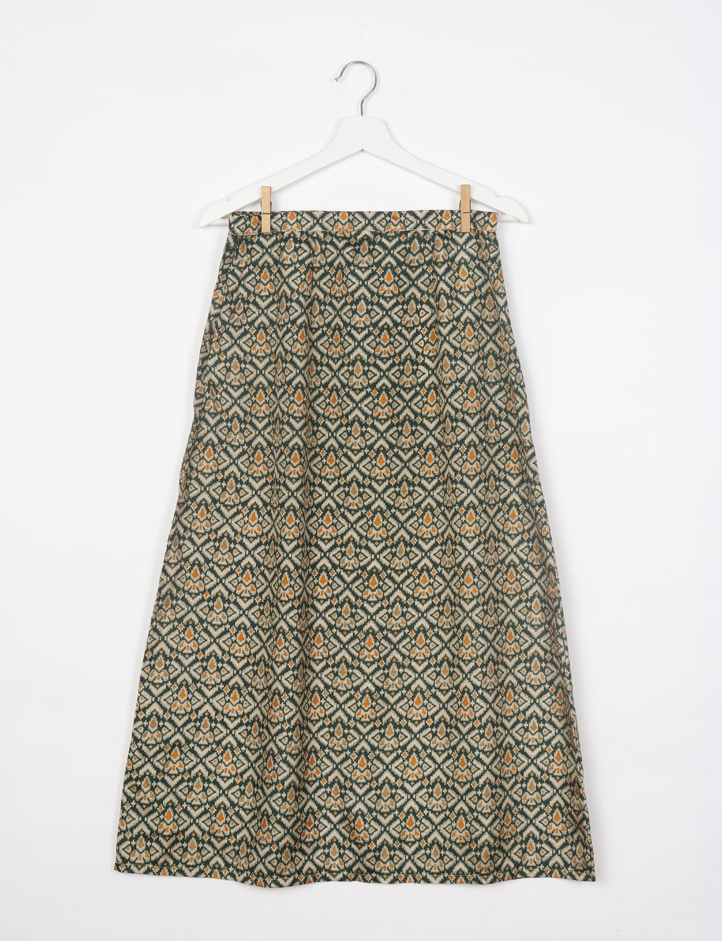 Sustainable A LINE SKIRT, a high-fashion choice for conscious individuals. Fitted at the waist, ankle-length, and ethically crafted for eco-friendly style.