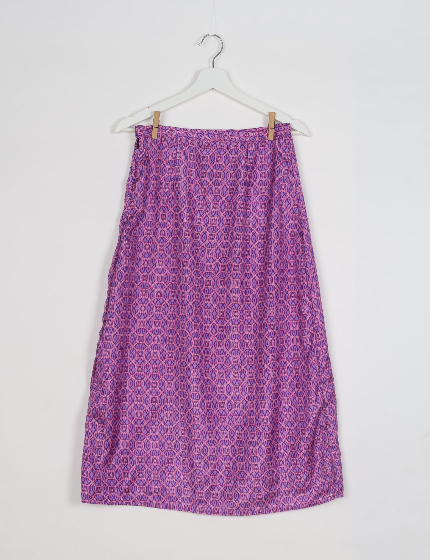 Sustainable A LINE SKIRT, a high-fashion choice for conscious individuals. Fitted at the waist, ankle-length, and ethically crafted for eco-friendly style.