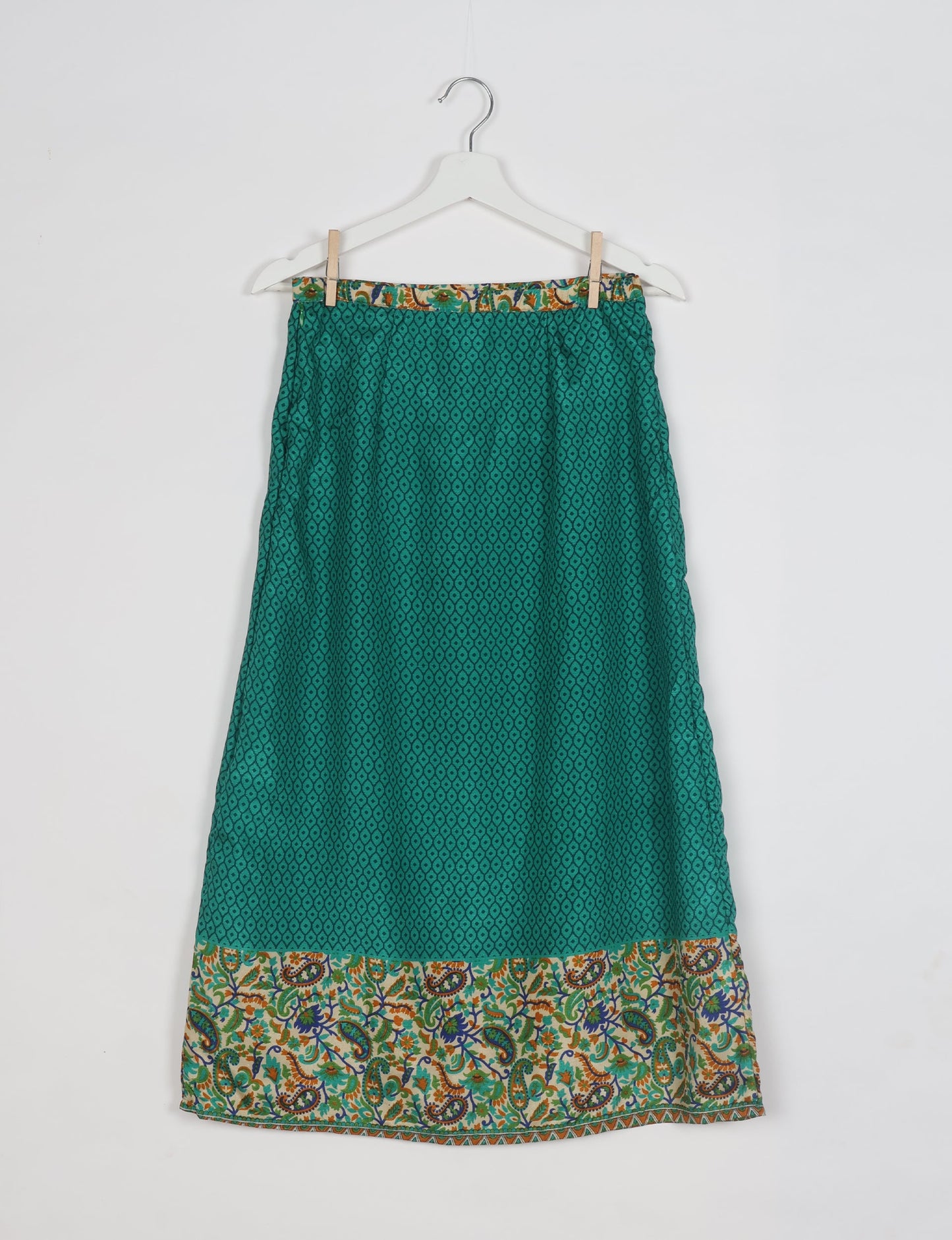 Sustainable A LINE SKIRT, a high-fashion choice for conscious individuals. Fitted at the waist, ankle-length, and ethically crafted for eco-friendly style.