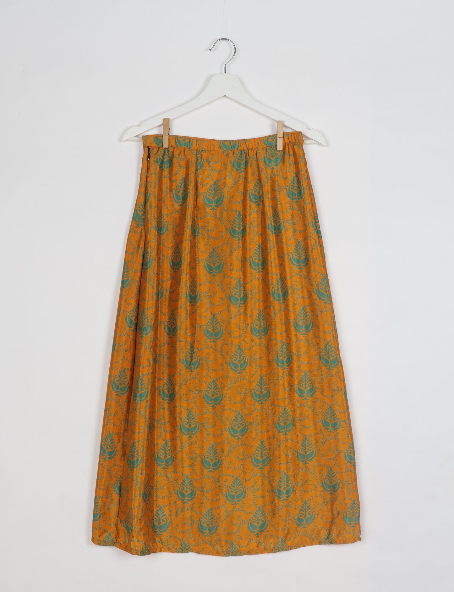 Sustainable A LINE SKIRT, a high-fashion choice for conscious individuals. Fitted at the waist, ankle-length, and ethically crafted for eco-friendly style.