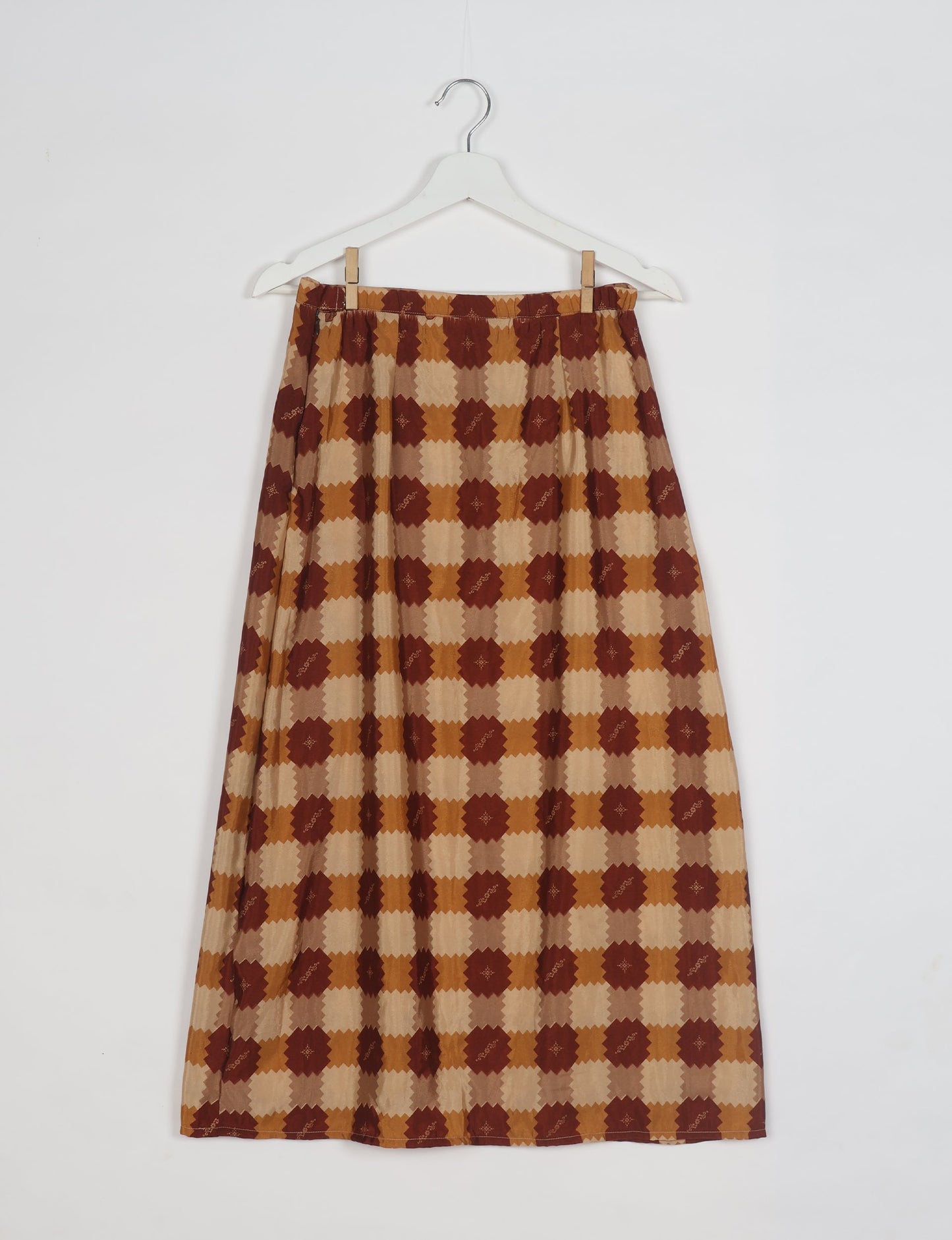 Sustainable A LINE SKIRT, a high-fashion choice for conscious individuals. Fitted at the waist, ankle-length, and ethically crafted for eco-friendly style.