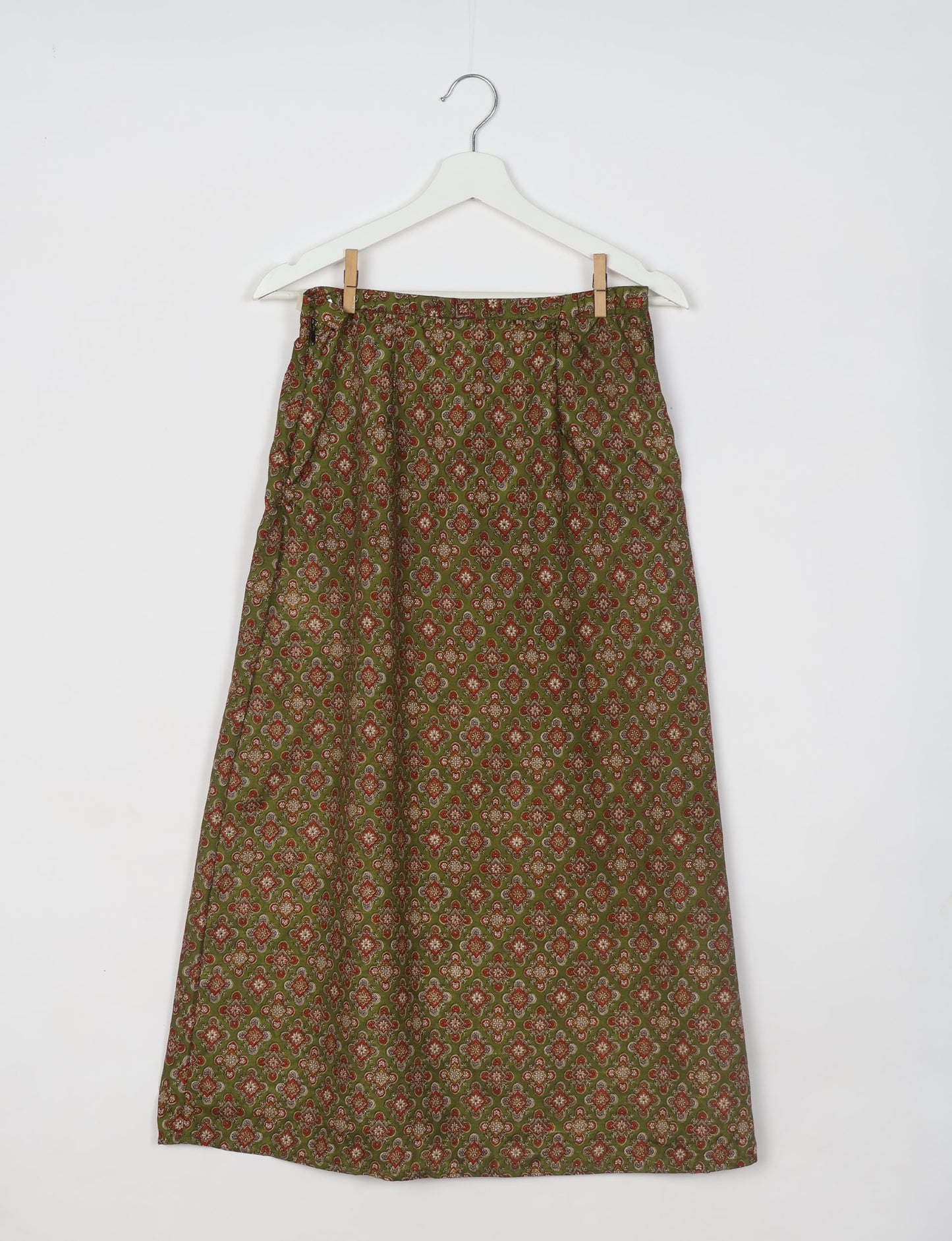 Sustainable A LINE SKIRT, a high-fashion choice for conscious individuals. Fitted at the waist, ankle-length, and ethically crafted for eco-friendly style.