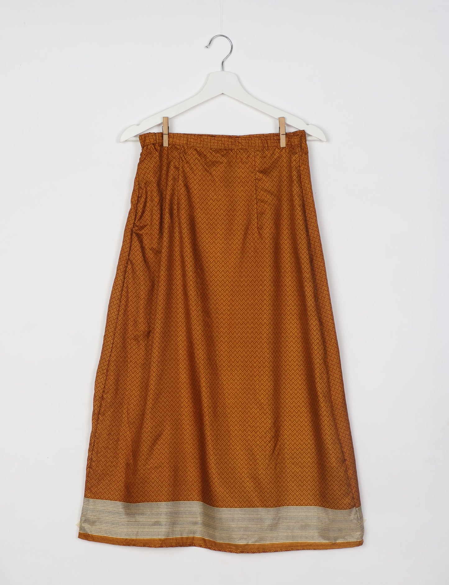 Sustainable A LINE SKIRT, a high-fashion choice for conscious individuals. Fitted at the waist, ankle-length, and ethically crafted for eco-friendly style.