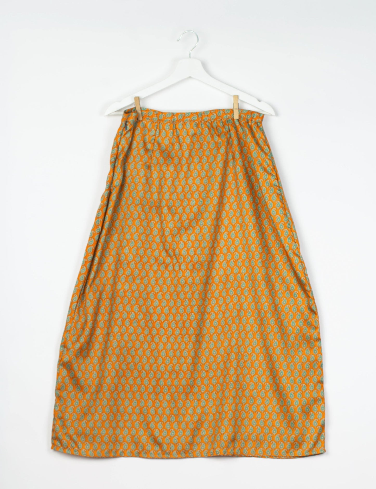 Sustainable A LINE SKIRT, a high-fashion choice for conscious individuals. Fitted at the waist, ankle-length, and ethically crafted for eco-friendly style.