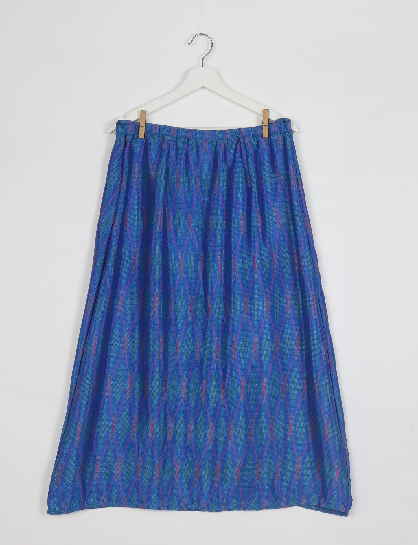 Sustainable A LINE SKIRT, a high-fashion choice for conscious individuals. Fitted at the waist, ankle-length, and ethically crafted for eco-friendly style.