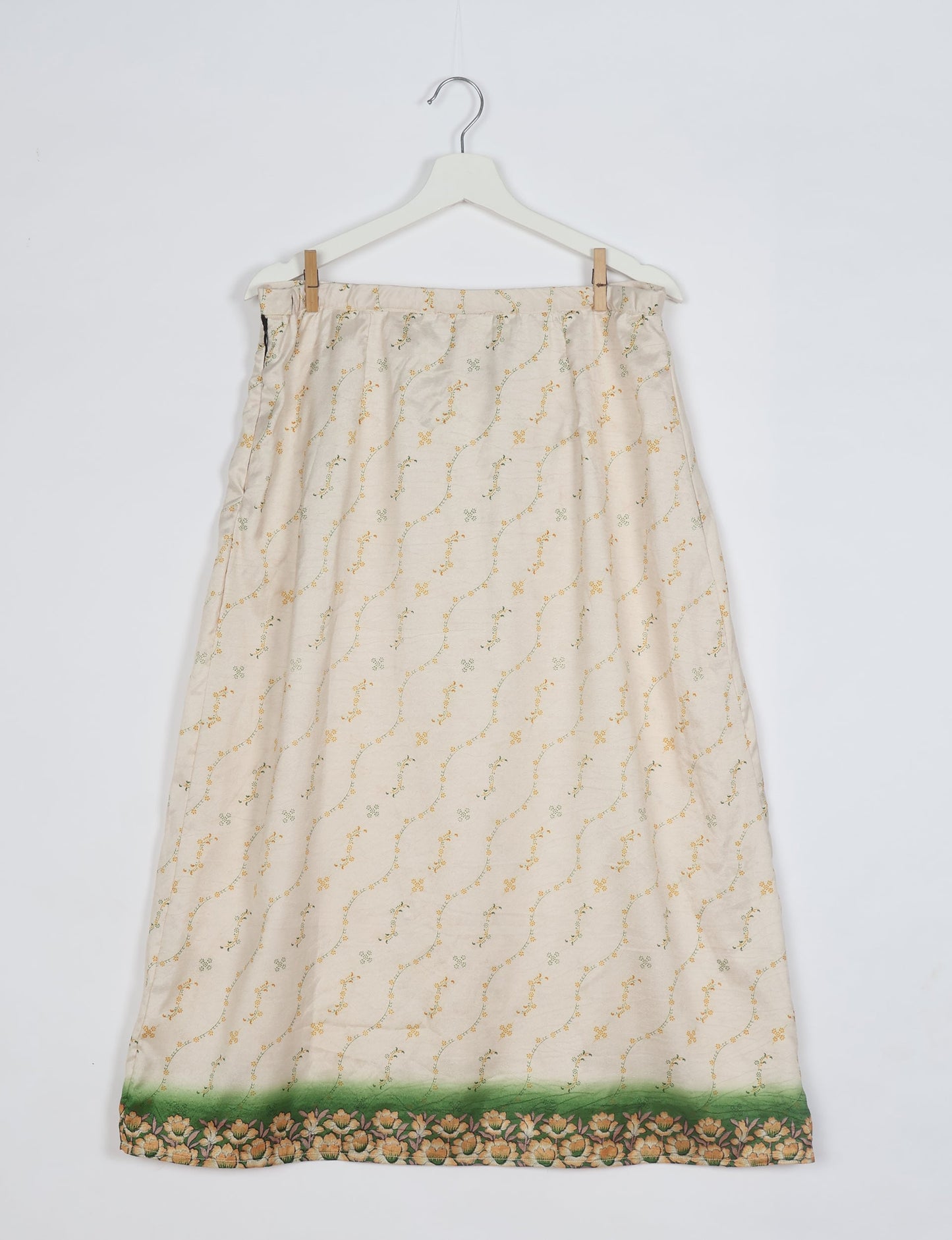 Sustainable A LINE SKIRT, a high-fashion choice for conscious individuals. Fitted at the waist, ankle-length, and ethically crafted for eco-friendly style.