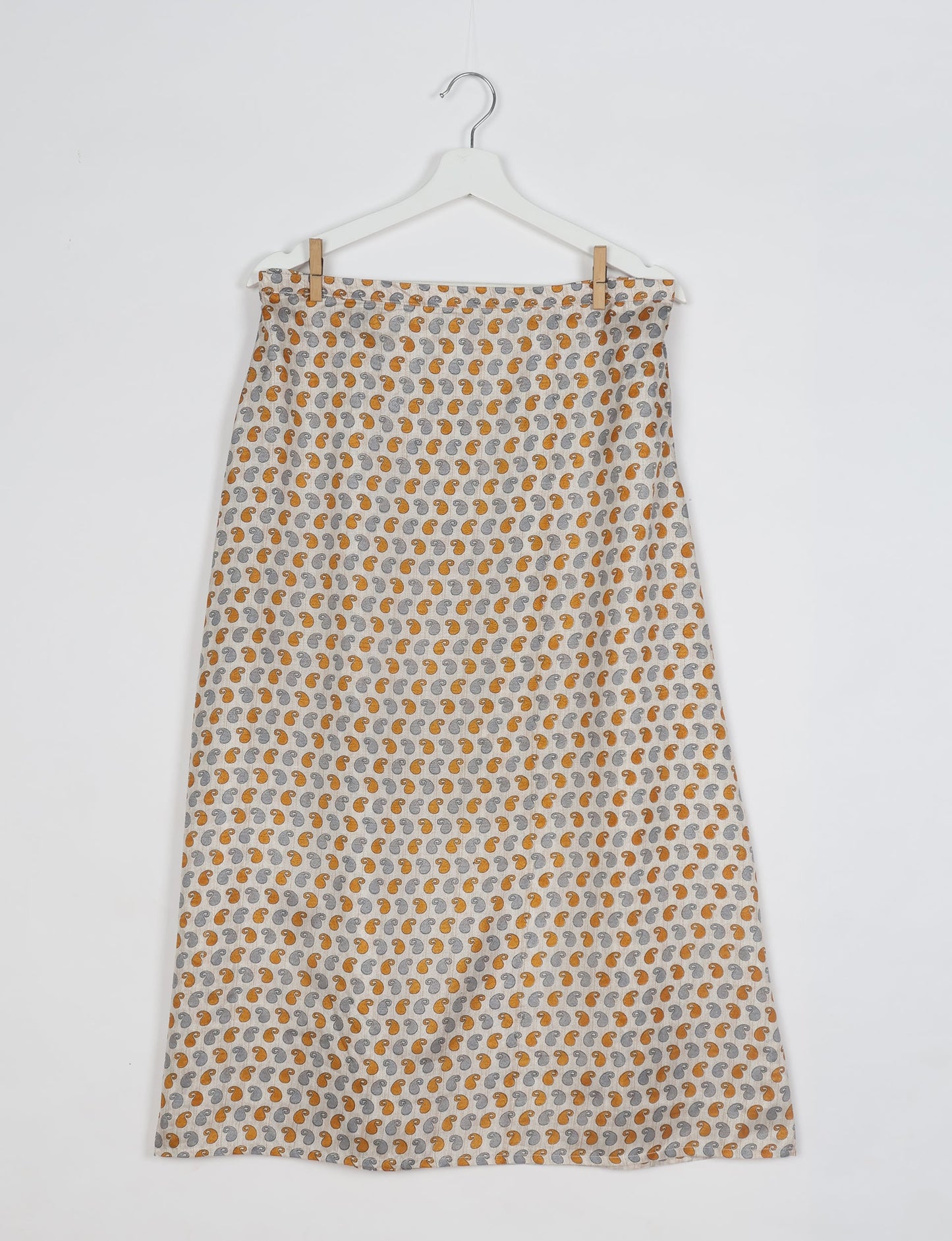 Sustainable A LINE SKIRT, a high-fashion choice for conscious individuals. Fitted at the waist, ankle-length, and ethically crafted for eco-friendly style.