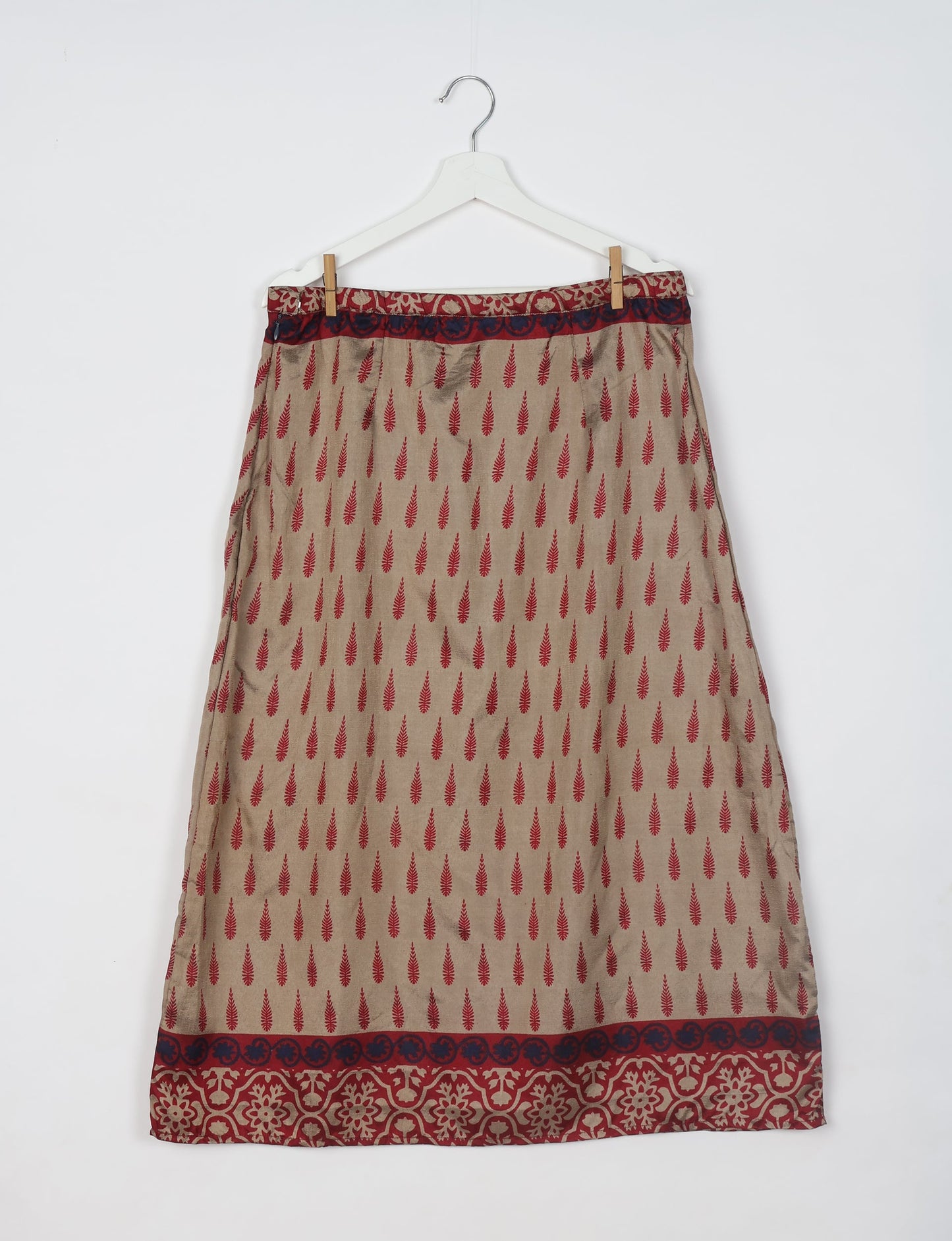 Sustainable A LINE SKIRT, a high-fashion choice for conscious individuals. Fitted at the waist, ankle-length, and ethically crafted for eco-friendly style.