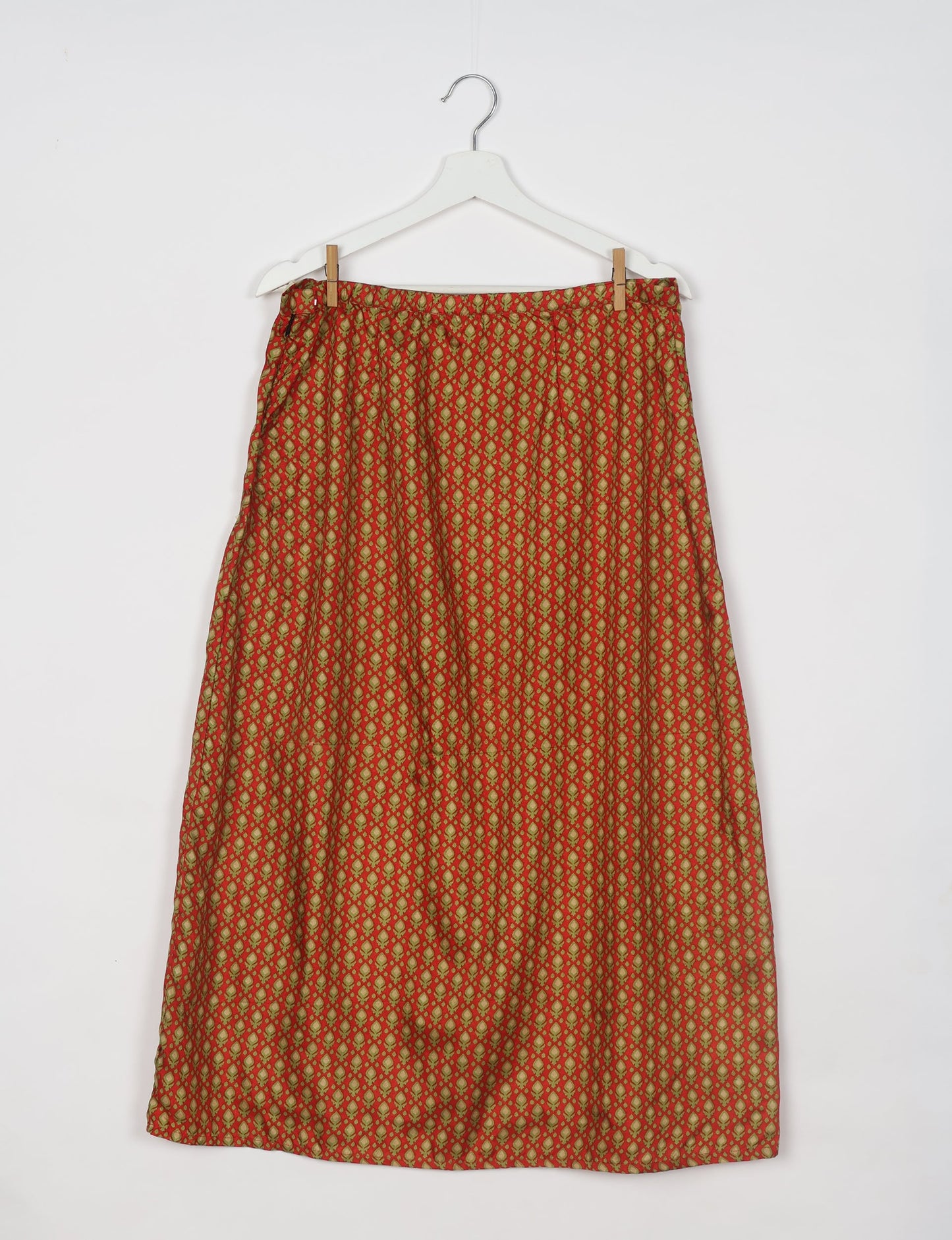 Sustainable A LINE SKIRT, a high-fashion choice for conscious individuals. Fitted at the waist, ankle-length, and ethically crafted for eco-friendly style.