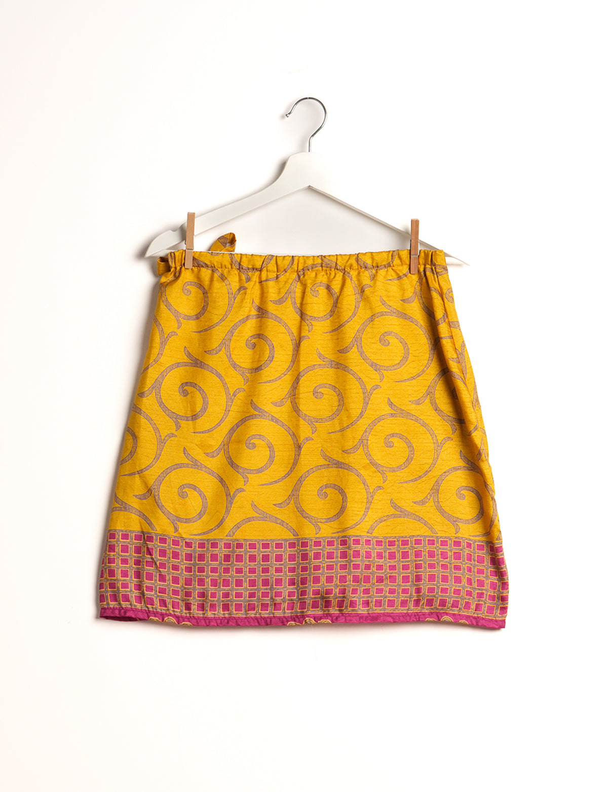 Revolutionize your look with our Wraparound Skirt – short, stylish, and suitable for all waist sizes. Ethical and sustainable, this skirt is a statement in eco-friendly fashion. Embrace conscious clothing with a touch of flair