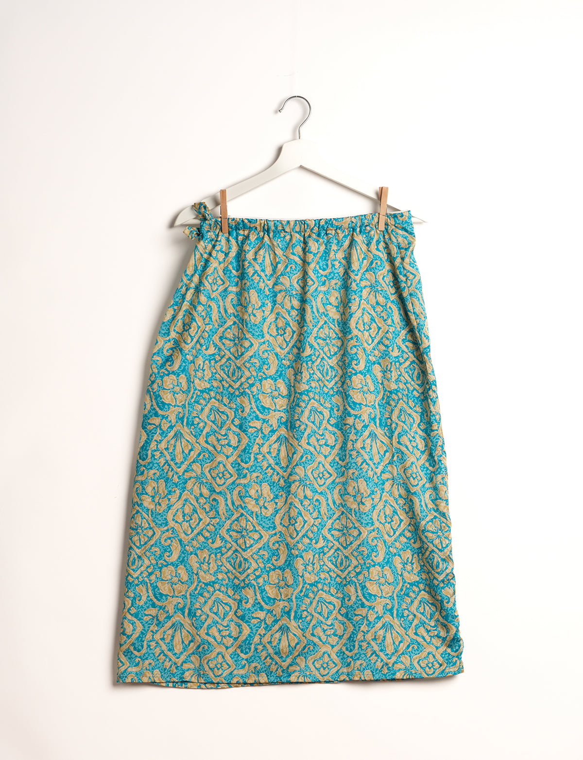 Versatile and sustainable LONG WRAPAROUND SKIRT, mid-calf length, defying convention and suitable for all waist sizes. Elevate your style with this eco-friendly and comfortable piece, creating a unique and inclusive fashion experience.