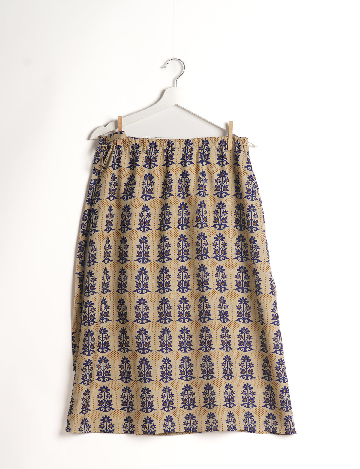 Versatile and sustainable LONG WRAPAROUND SKIRT, mid-calf length, defying convention and suitable for all waist sizes. Elevate your style with this eco-friendly and comfortable piece, creating a unique and inclusive fashion experience.