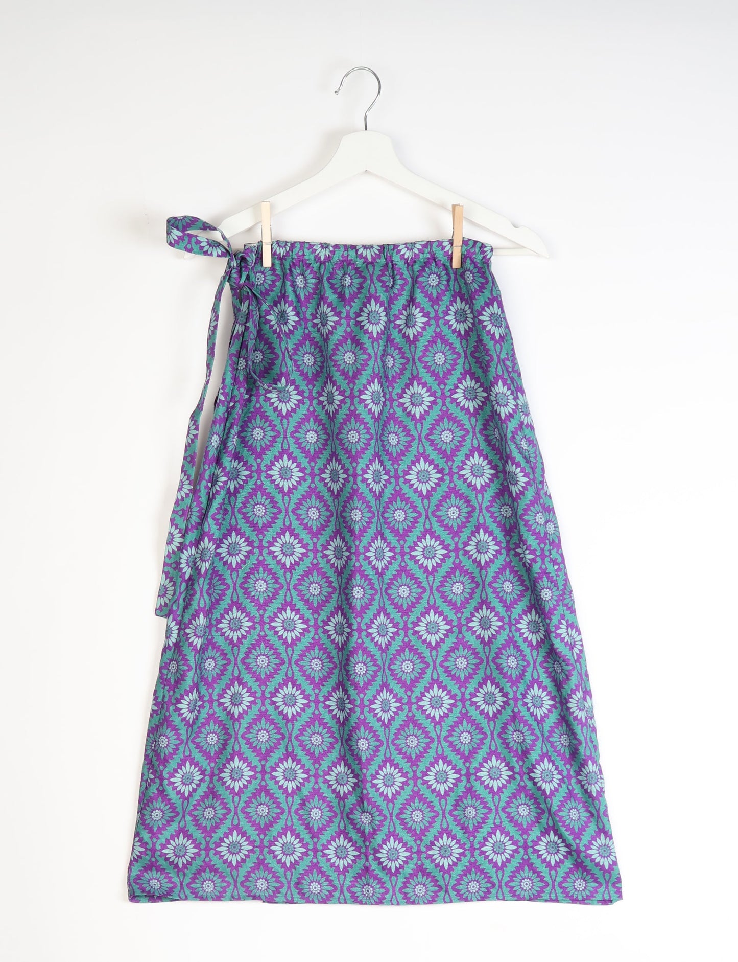Versatile and sustainable LONG WRAPAROUND SKIRT, mid-calf length, defying convention and suitable for all waist sizes. Elevate your style with this eco-friendly and comfortable piece, creating a unique and inclusive fashion experience.
