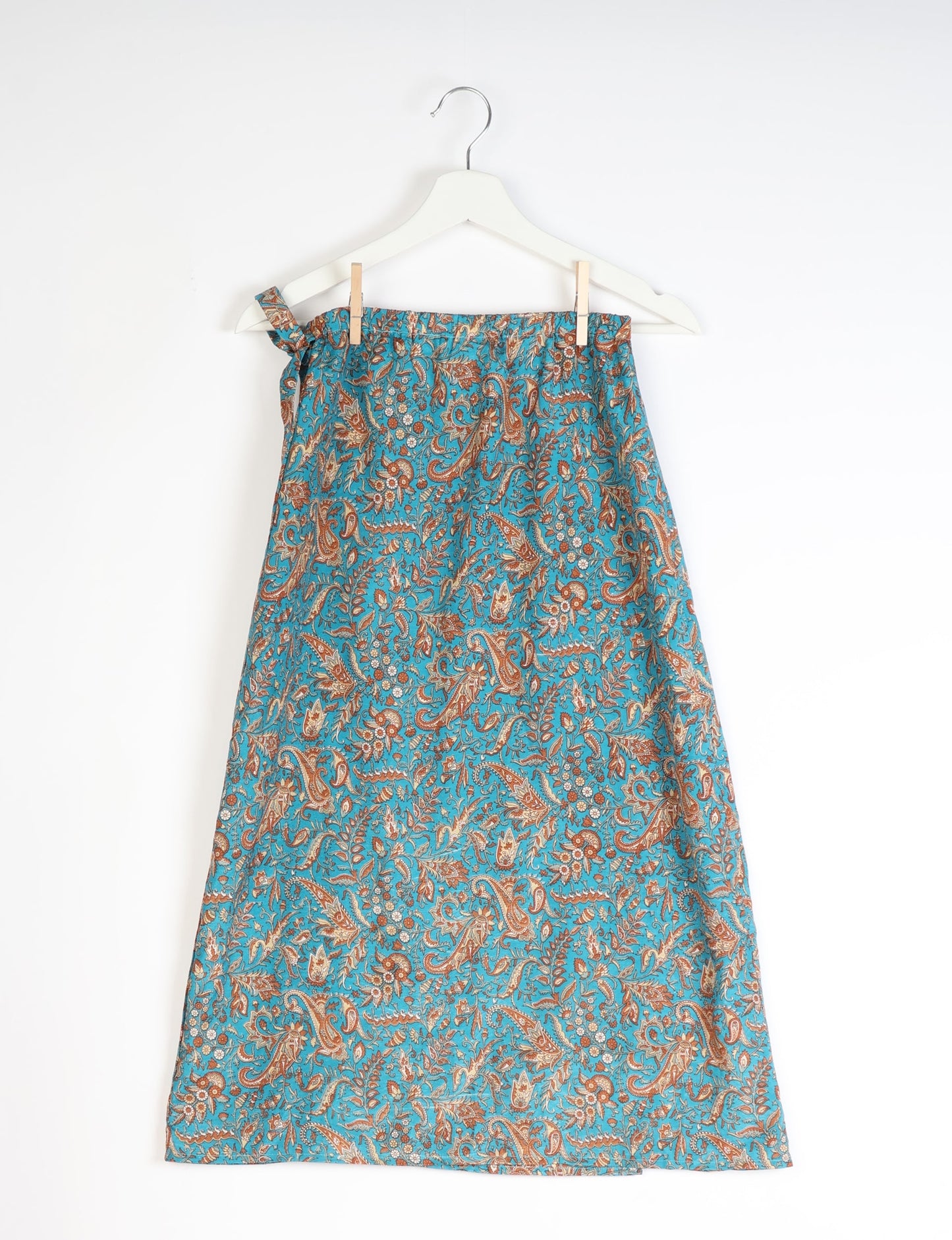 Versatile and sustainable LONG WRAPAROUND SKIRT, mid-calf length, defying convention and suitable for all waist sizes. Elevate your style with this eco-friendly and comfortable piece, creating a unique and inclusive fashion experience.