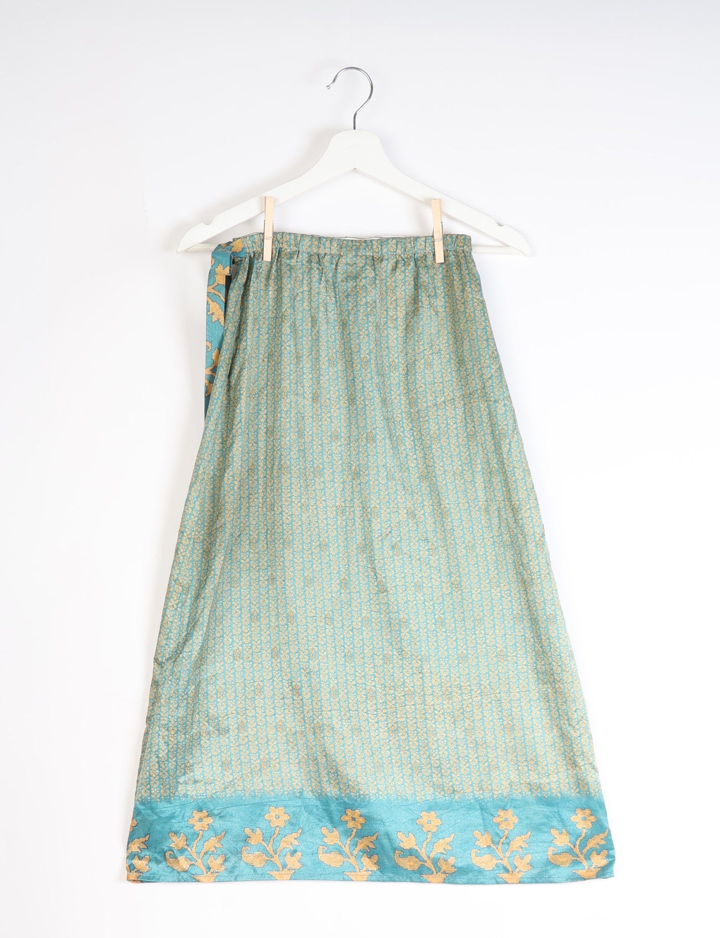 Versatile and sustainable LONG WRAPAROUND SKIRT, mid-calf length, defying convention and suitable for all waist sizes. Elevate your style with this eco-friendly and comfortable piece, creating a unique and inclusive fashion experience.