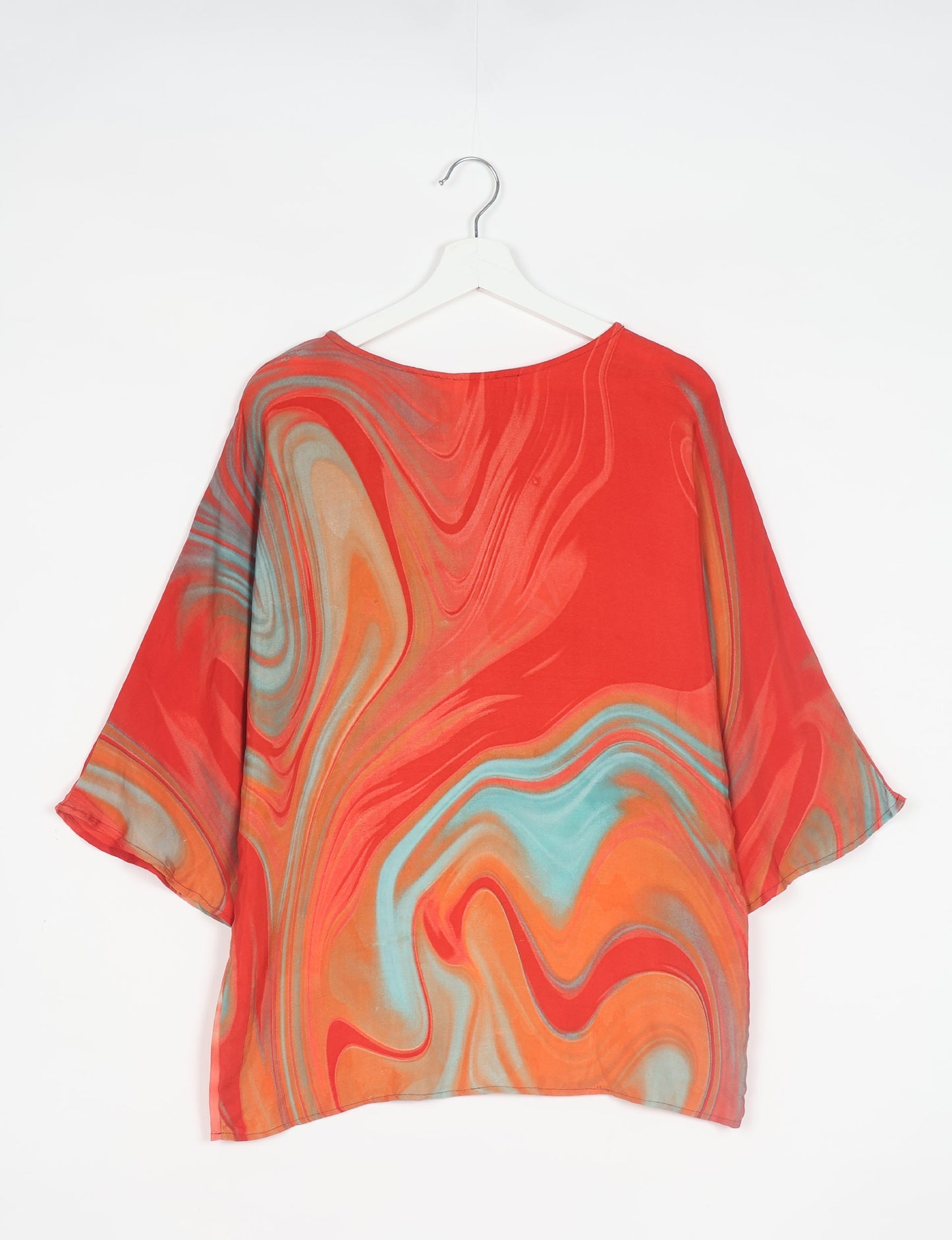 Upcycled women’s Belt Top made from pre-loved saris, showcasing eco friendly cloth, carbon neutral clothing, circular fashion design, environmentally friendly clothing, and second hand clothing elegance.