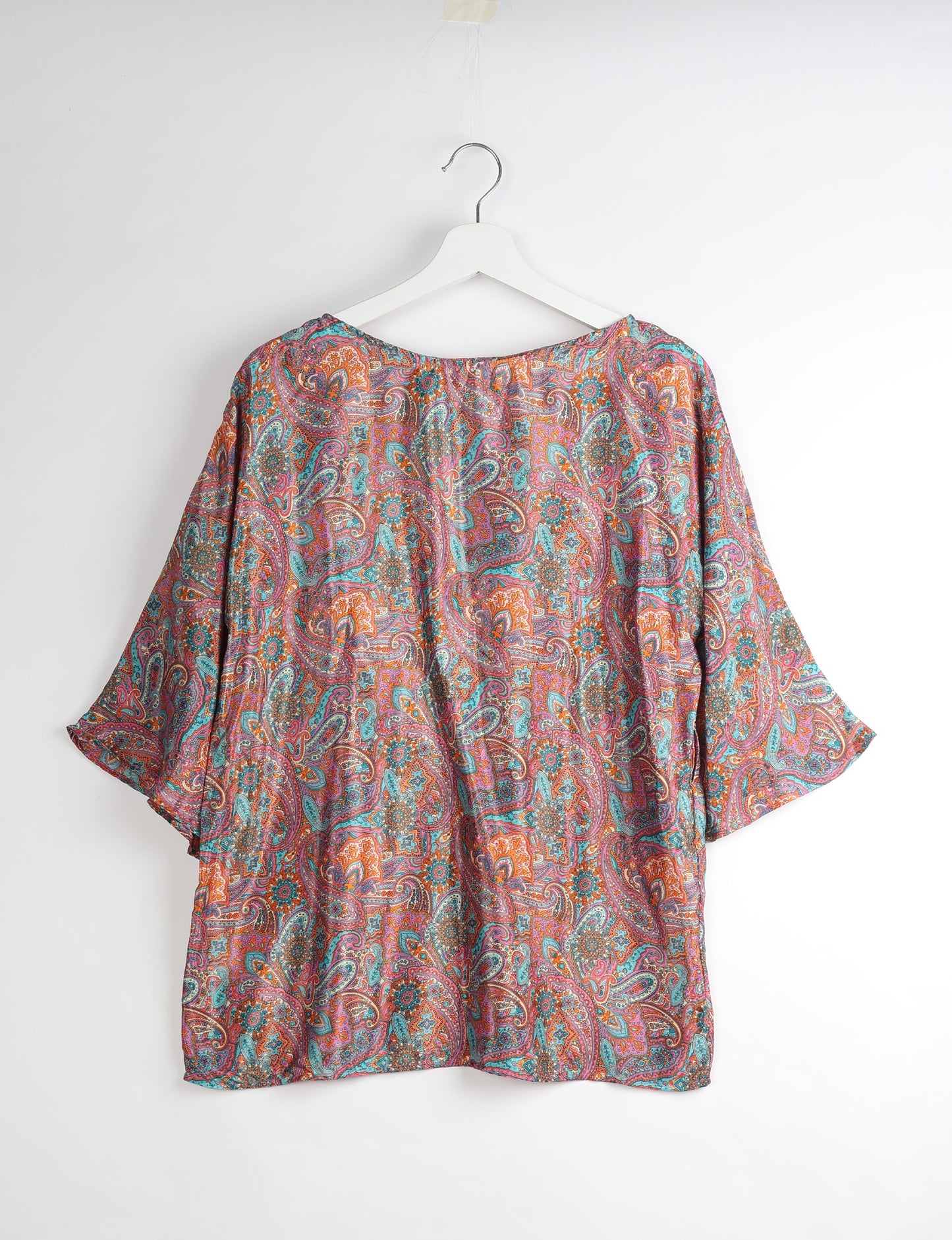 Upcycled women’s Belt Top made from pre-loved saris, showcasing eco friendly cloth, carbon neutral clothing, circular fashion design, environmentally friendly clothing, and second hand clothing elegance.