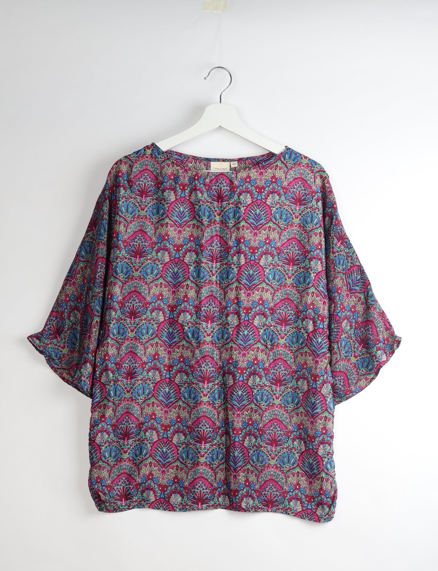 Upcycled women’s Belt Top made from pre-loved saris, showcasing eco friendly cloth, carbon neutral clothing, circular fashion design, environmentally friendly clothing, and second hand clothing elegance.