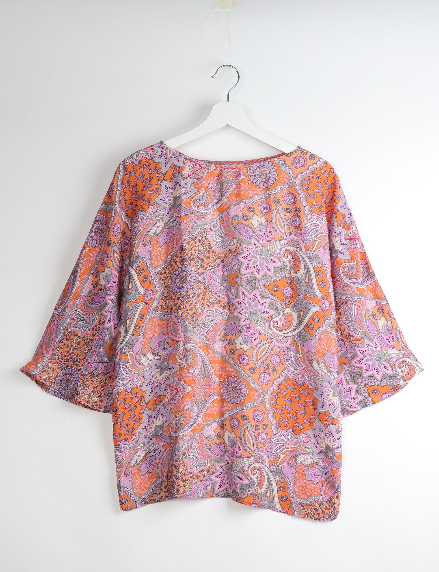 Upcycled women’s Belt Top made from pre-loved saris, showcasing eco friendly cloth, carbon neutral clothing, circular fashion design, environmentally friendly clothing, and second hand clothing elegance.