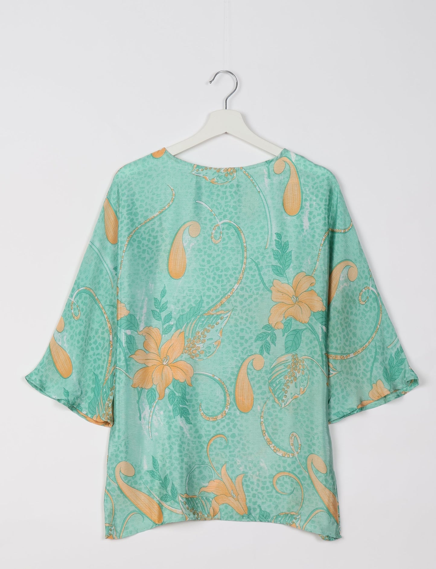 Upcycled women’s Belt Top made from pre-loved saris, showcasing eco friendly cloth, carbon neutral clothing, circular fashion design, environmentally friendly clothing, and second hand clothing elegance.