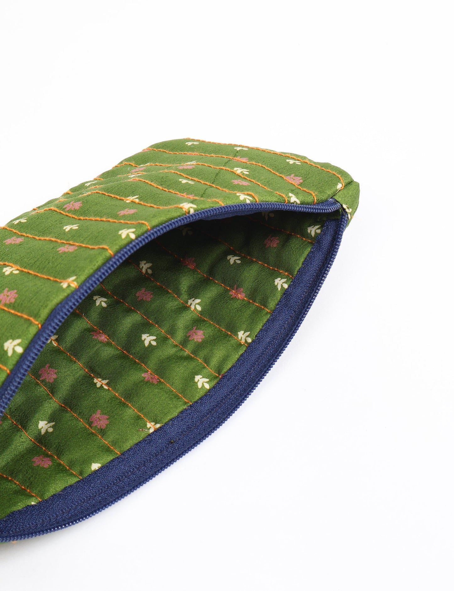 Quilted pencil pouch made from recycled clothing and repurposed textiles, promoting eco friendly fashion and circular fashion ideals. A durable, stylish storage option inspired by recycled sari products, upcycled women’s clothing, and earth friendly fashion practices.