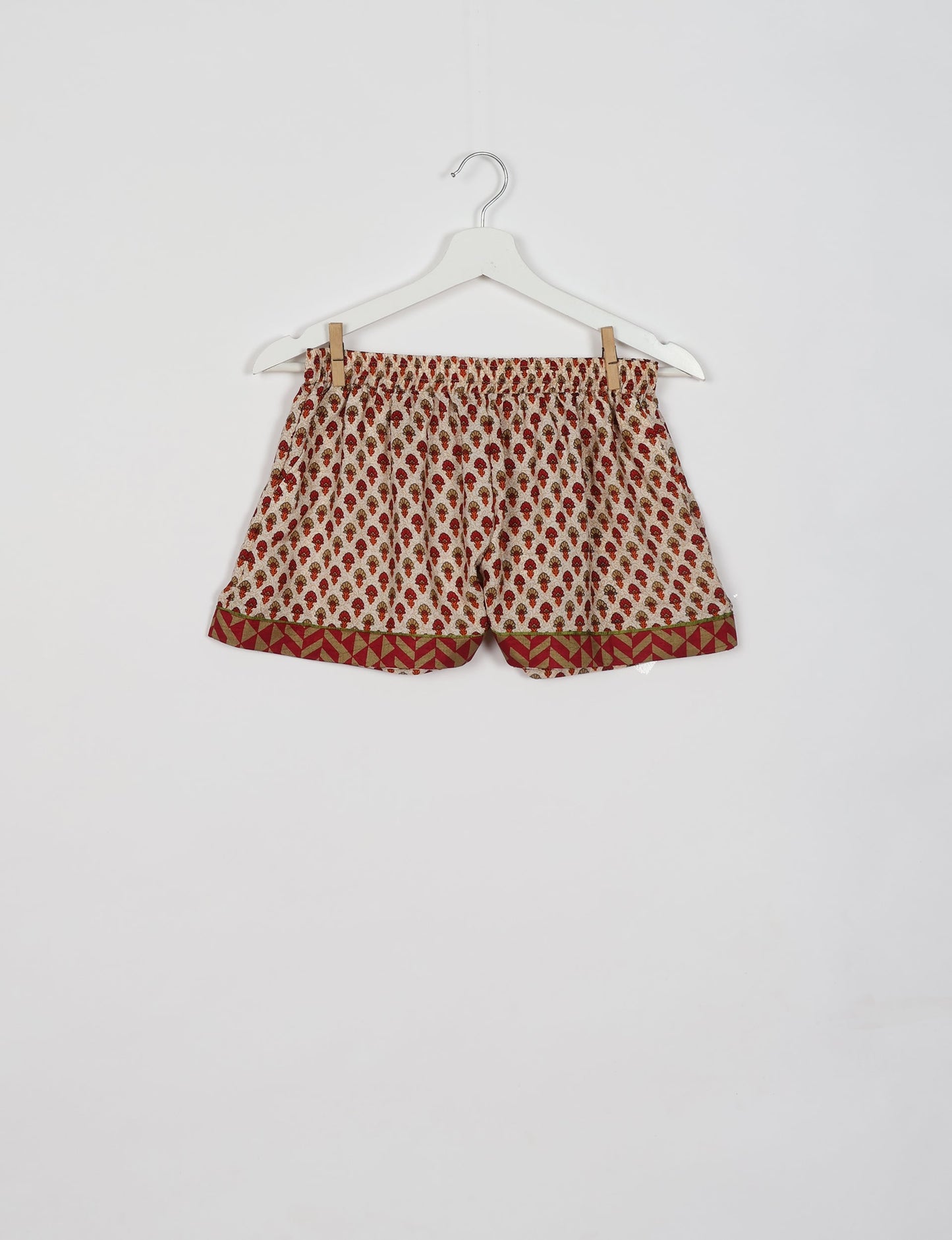 Indulge in comfort and style with our PJ Set Short, now with short sleeves. Crafted from upcycled saris, these shorts embody a zero-waste mentality for sustainable sleepwear. Versatile from day to night, perfect for beach lounging or poolside yoga, these pajamas redefine conscious fashion.