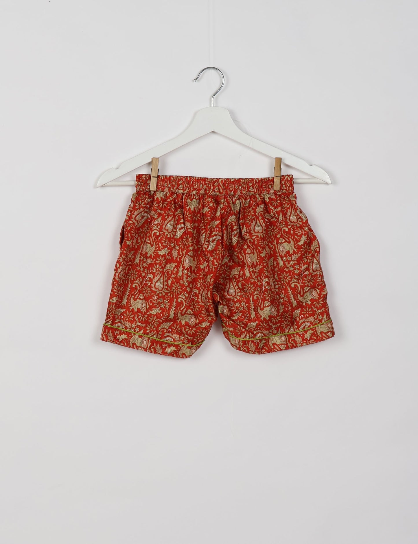 Indulge in comfort and style with our PJ Set Short, now with short sleeves. Crafted from upcycled saris, these shorts embody a zero-waste mentality for sustainable sleepwear. Versatile from day to night, perfect for beach lounging or poolside yoga, these pajamas redefine conscious fashion.