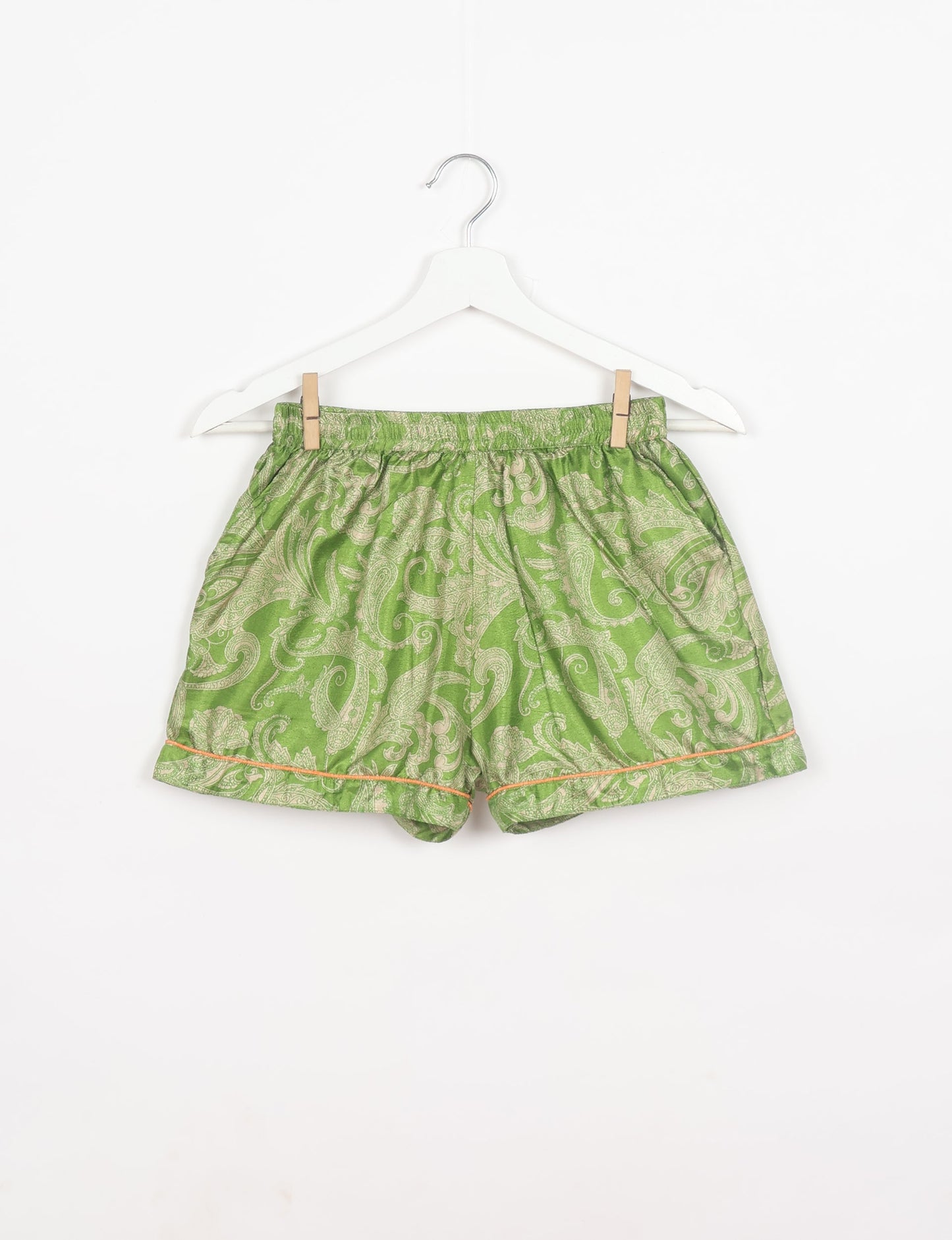 Indulge in comfort and style with our PJ Set Short, now with short sleeves. Crafted from upcycled saris, these shorts embody a zero-waste mentality for sustainable sleepwear. Versatile from day to night, perfect for beach lounging or poolside yoga, these pajamas redefine conscious fashion.