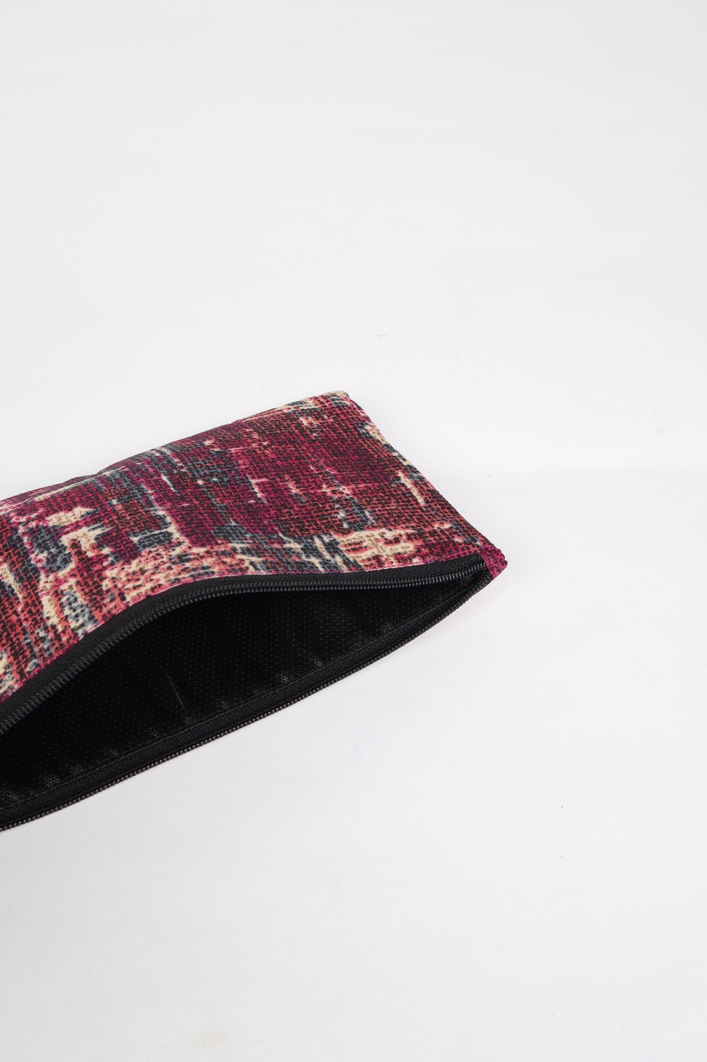 Eco-conscious quilted pencil pouch with waterproof lining made from upcycled garments, reflecting the values of circular fashion, carbon neutral fashion, and repurposed clothing. A perfect example of green fashion and sustainable women's clothing.