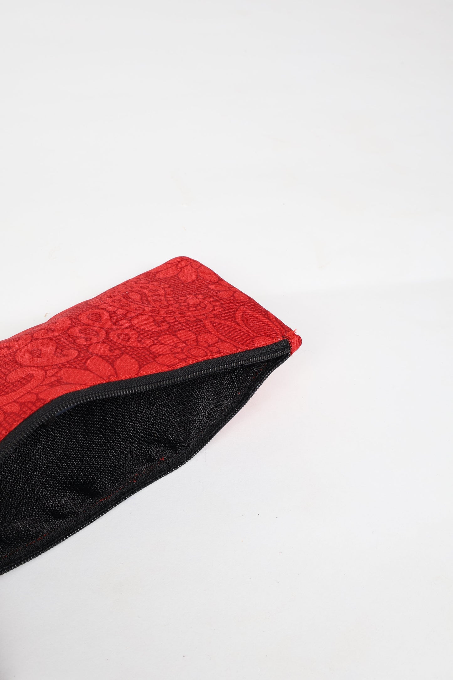 Eco-conscious quilted pencil pouch with waterproof lining made from upcycled garments, reflecting the values of circular fashion, carbon neutral fashion, and repurposed clothing. A perfect example of green fashion and sustainable women's clothing.