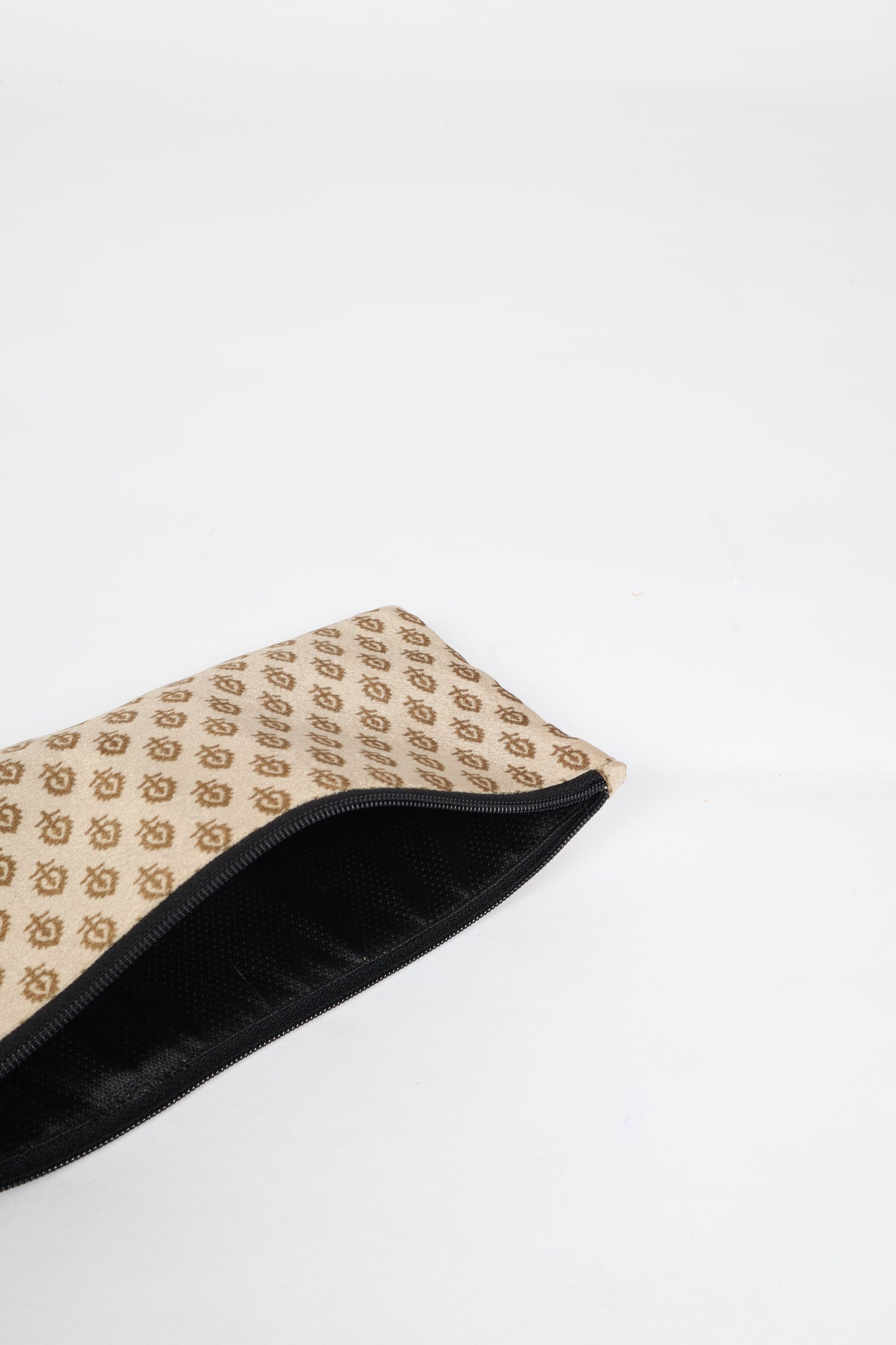 Eco-conscious quilted pencil pouch with waterproof lining made from upcycled garments, reflecting the values of circular fashion, carbon neutral fashion, and repurposed clothing. A perfect example of green fashion and sustainable women's clothing.